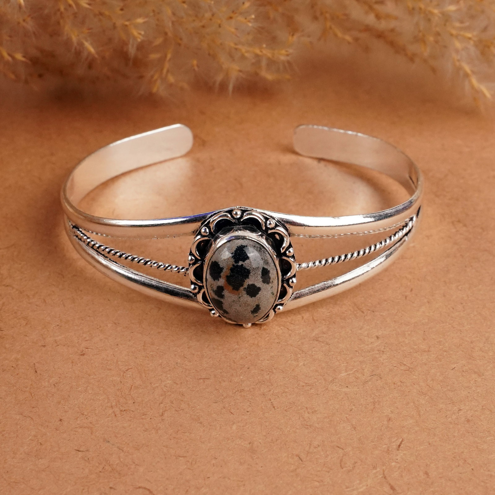 Natural Dalmatian Silver Plated Handmade Cuff Bangle: Product ID: 260408152205 Product - Handmade Silver Plated Cuff Bangle Metal - 925 Sterling Silver Plated Bangle Size - 6.5x5 CM (Adjustable) Gemstone - Dalmatian Gemstone Origin - Mexico Gemstone Size