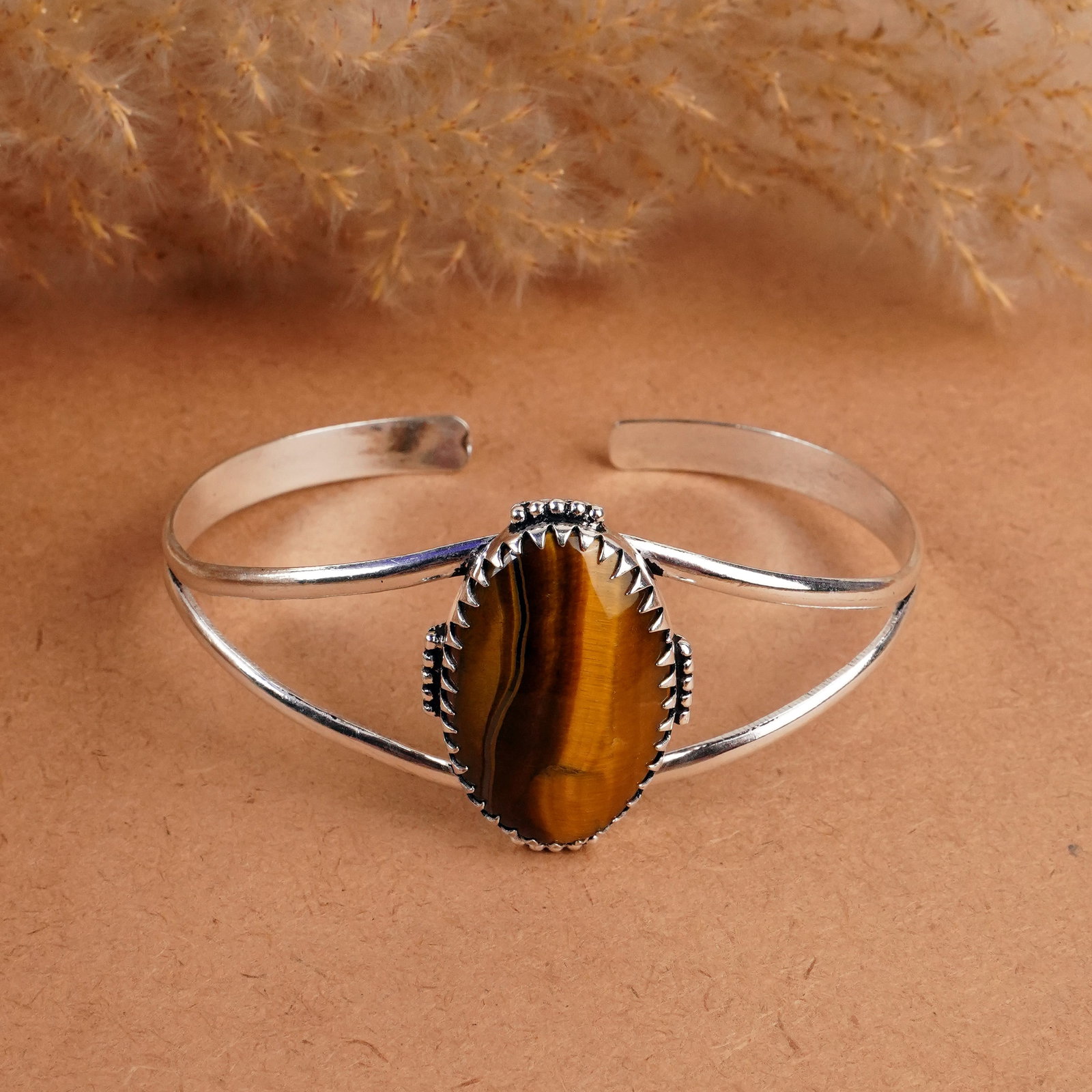 Natural Tiger Eye Silver Plated Handmade Cuff Bangle: Product ID: 260408152049 Product - Handmade Silver Plated Cuff Bangle Metal - 925 Sterling Silver Plated Bangle Size - 7x5.5 CM (Adjustable) Gemstone - Tiger Eye Gemstone Origin - South Africa Gemston