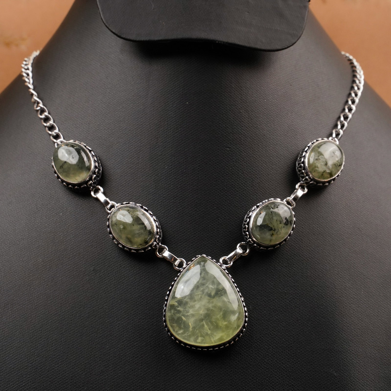 Natural Prehnite Silver Plated Handmade Choker Necklace: Product ID: 260409133015 Product - Handmade Silver Plated Necklace Metal - 925 Sterling Silver Plated Necklace Length - 18 Inch Gemstone - Prehnite Gemstone Size - 12X16 MM ( 4 Stone) 24x20 MM ( 1 Sto