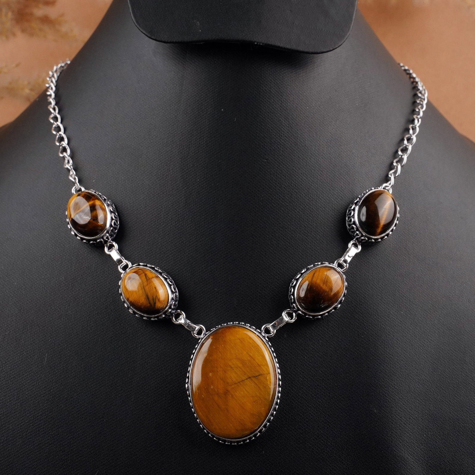 Natural Tiger Eye Silver Plated Handmade Choker Necklace: Product ID: 260409130410 Product - Handmade Silver Plated Necklace Metal - 925 Sterling Silver Plated Necklace Length - 18 Inch Gemstone - Tiger Eye Gemstone Size - 12X16 MM (4 Stone), 24X20 MM (1 Sto