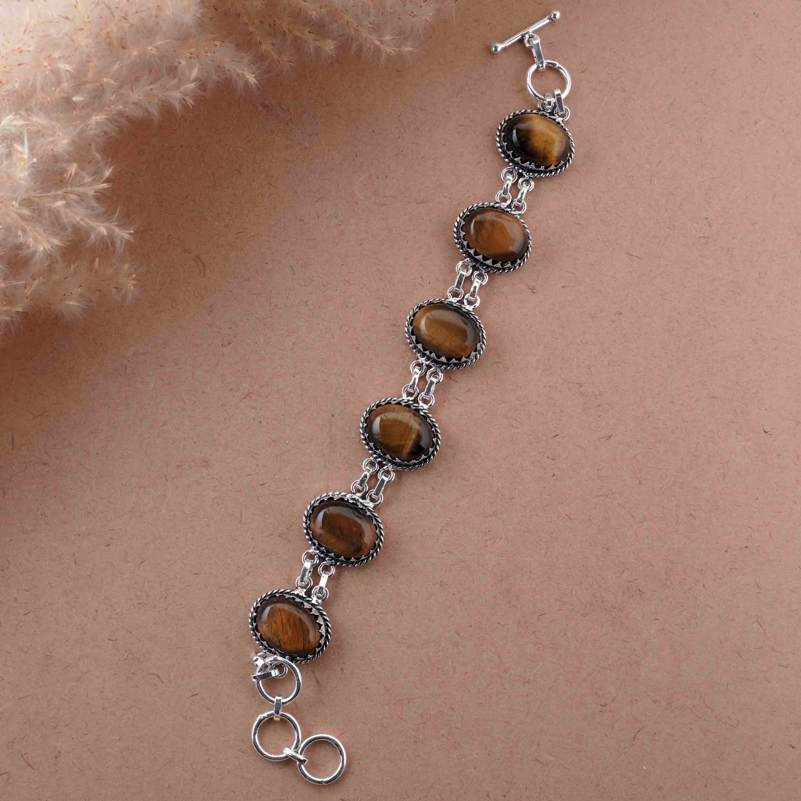 Natural Tiger Eye Sterling Silver Plated Handmade Bracelet: Product ID: 260418121311 Product - Handmade Silver Plated Bracelet Metal - 925 Sterling Silver Plated Bracelet Length - 6 Inch + 2 Inch Gemstone - Tiger Eye Gemstone Size -12X16 MM ( 6 Stone) Gemstone