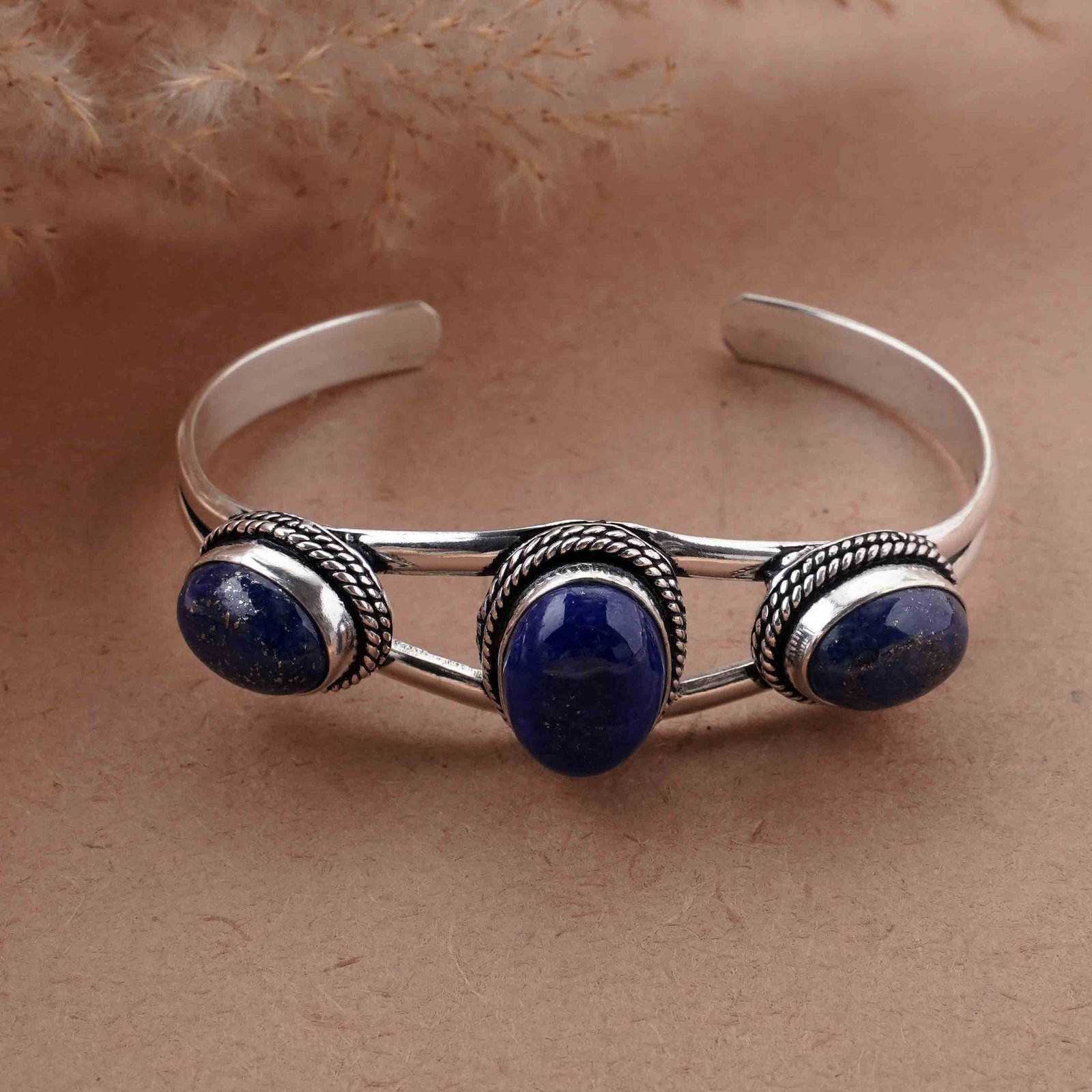Natural Lapis Lazuli Silver Plated Handmade Cuff Bangle: Product ID: 260417180456 Product - Handmade Silver Plated Cuff Bangle Metal - 925 Sterling Silver Plated Bangle Size - 6.5x4.5 CM (Adjustable) Gemstone - Lapis Lazuli Gemstone Origin - Afghanistan Gem