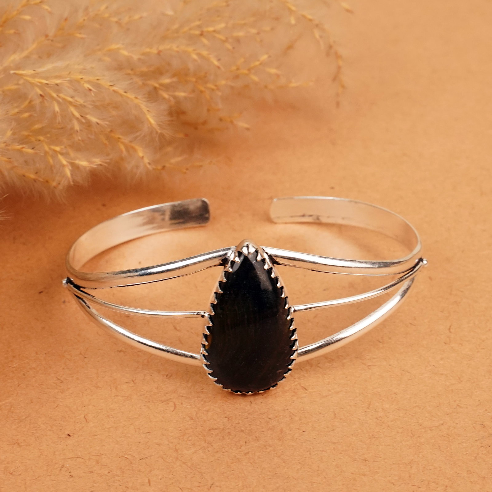Natural Black Tiger Eye Silver Plated Handmade Cuff Bangle: Product ID: 260412133259 Product - Handmade Silver Plated Cuff Bangle Metal - 92.5 Sterling Silver Plated Bangle Size - 7.5x5.5 CM (Adjustable) Gemstone - Black Tiger Eye Gemstone Origin - South Afric