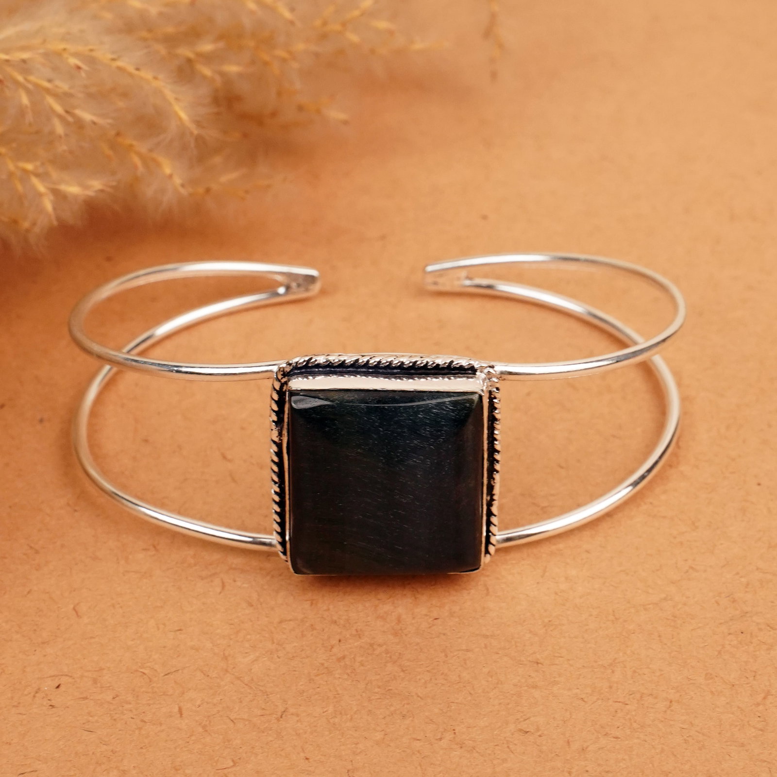 Natural Black Tiger Eye Silver Plated Handmade Cuff Bangle: Product ID: 260412133143 Product - Handmade Silver Plated Cuff Bangle Metal - 92.5 Sterling Silver Plated Bangle Size - 7.5x5.5 CM (Adjustable) Gemstone - Black Tiger Eye Gemstone Origin - South Afric