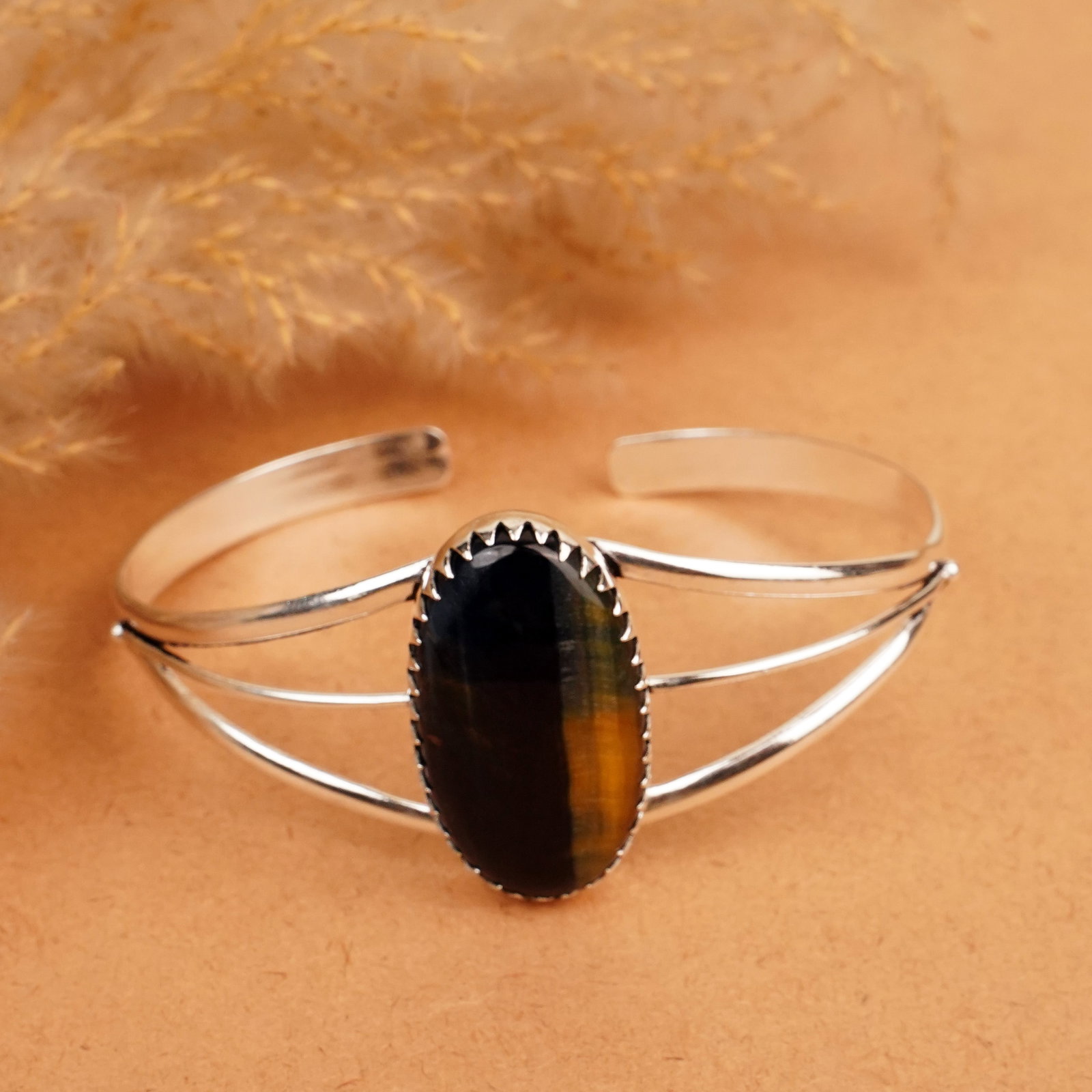 Natural Black Tiger Eye Silver Plated Handmade Cuff Bangle: Product ID: 260412111735 Product - Handmade Silver Plated Cuff Bangle Metal - 92.5 Sterling Silver Plated Bangle Size - 7.5x5.5 CM (Adjustable) Gemstone - Black Tiger Eye Gemstone Origin - South Afric