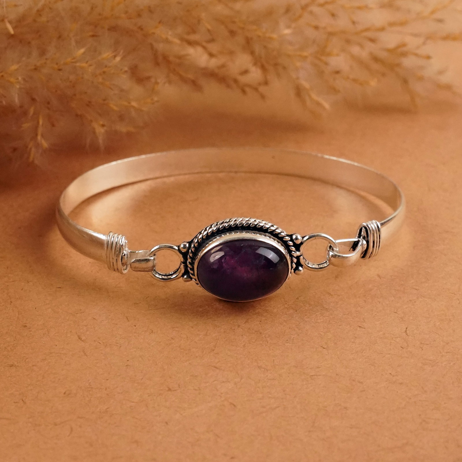 Natural Amethyst Silver Plated Handmade Cuff Bangle: Product ID: 260411165154 Product - Handmade Silver Plated Cuff Bangle Metal - 92.5 Sterling Silver Plated Bangle Size - 7x5 CM Gemstone - Amethyst Gemstone Origin - Brazil Gemstone Size - 10X14 MM Gem