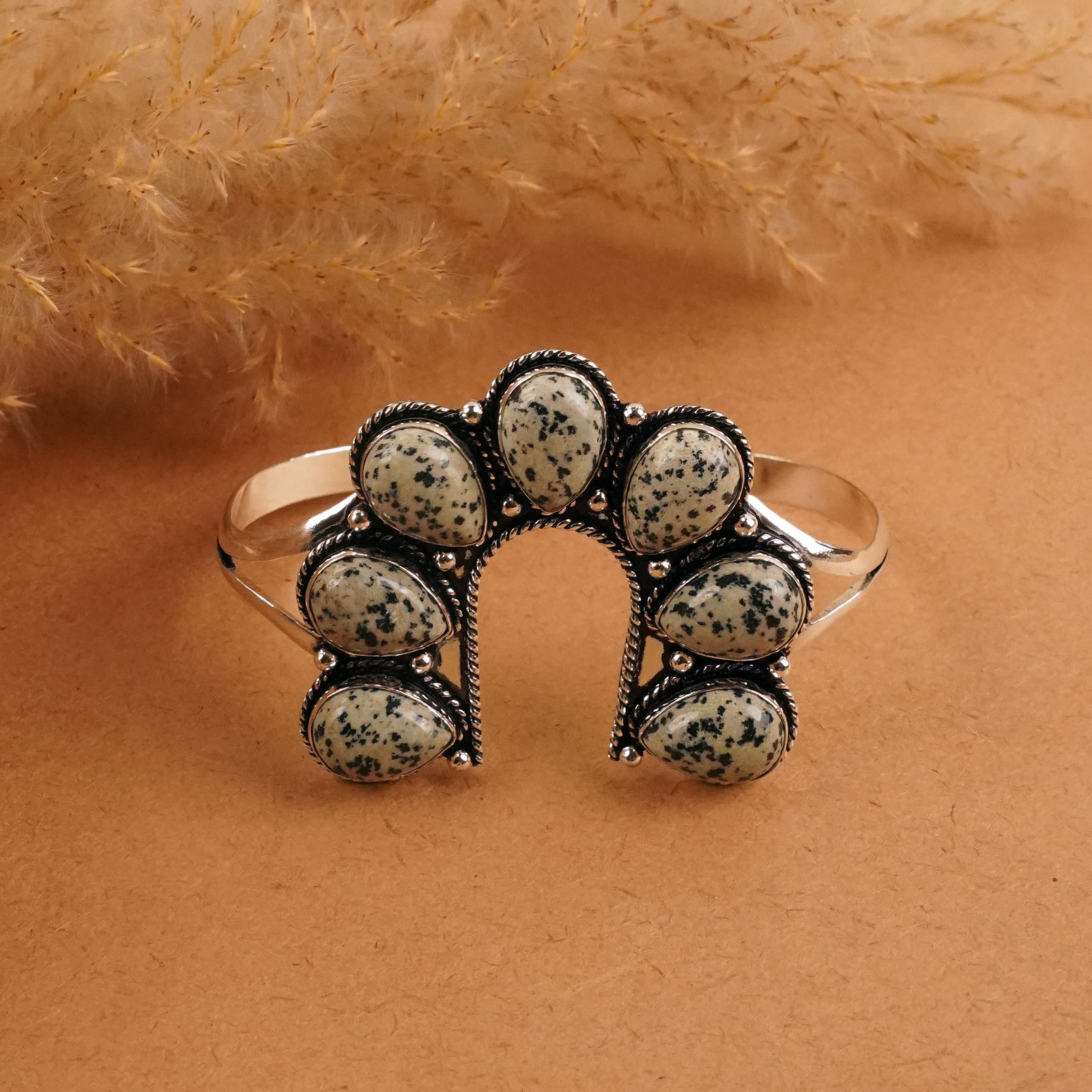 Natural Dalmatian Jasper Silver Plated Handmade Cuff Bangle: Product ID: 260411164010 Product - Handmade Silver Plated Cuff Bangle Metal - 92.5 Sterling Silver Plated Bangle Size - 6.5x4 CM (Adjustable) Gemstone - Dalmatian Jasper Gemstone Origin - Mexico Gemst
