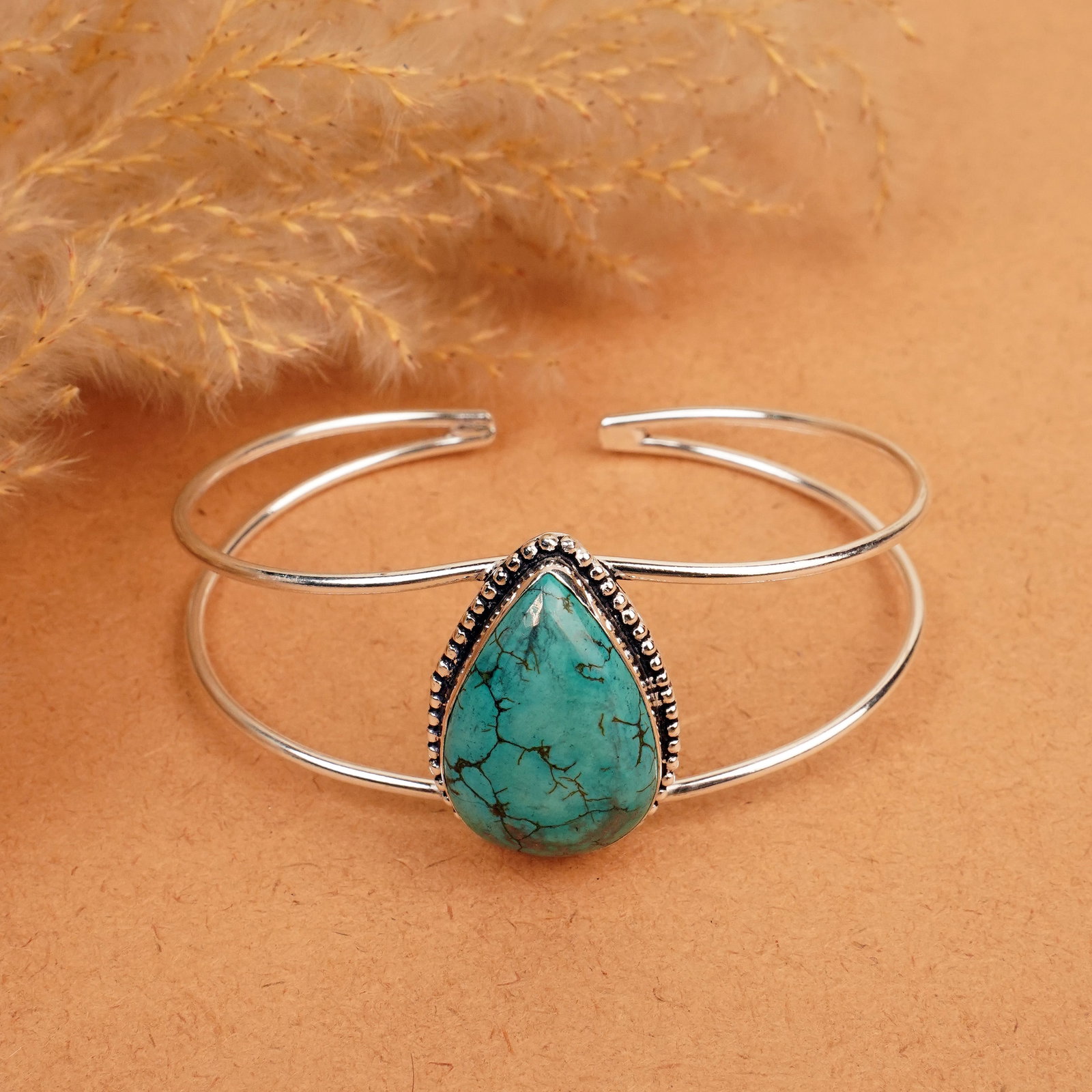 Natural Turquoise Silver Plated Handmade Cuff Bangle: Product ID: 260412115145 Product - Handmade Silver Plated Cuff Bangle Metal - 92.5 Sterling Silver Plated Bangle Size - 7.5x5.5 CM (Adjustable) Gemstone - Turquoise Gemstone Origin - Tibet Gemstone Si