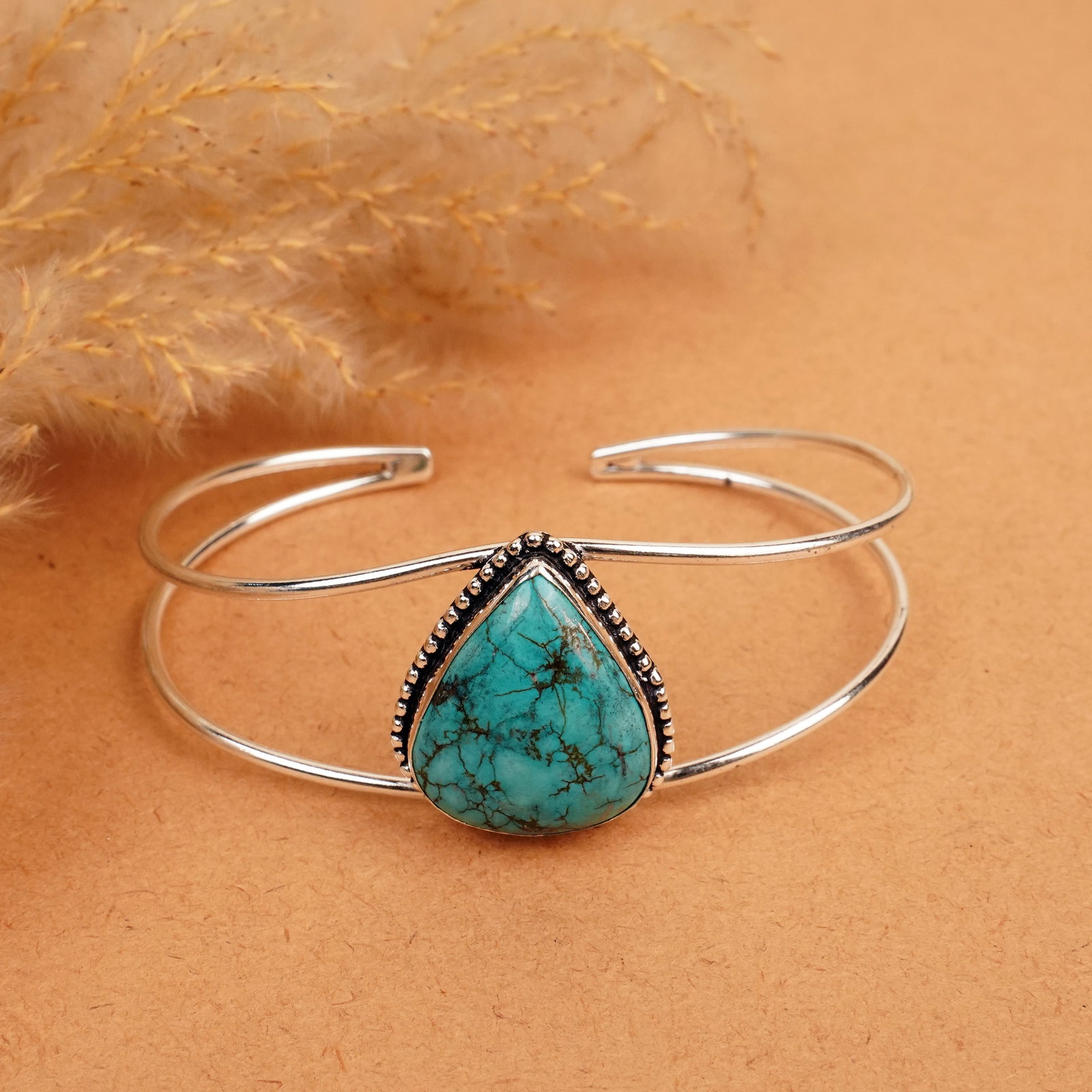 Natural Tibetan Turquoise Silver Plated Handmade Cuff Bangle: Product ID: 260412114044 Product - Handmade Silver Plated Cuff Bangle Metal - 92.5 Sterling Silver Plated Bangle Size - 7.5x5.5 CM (Adjustable) Gemstone - Turquoise Gemstone Origin - Tibet Gemstone Si