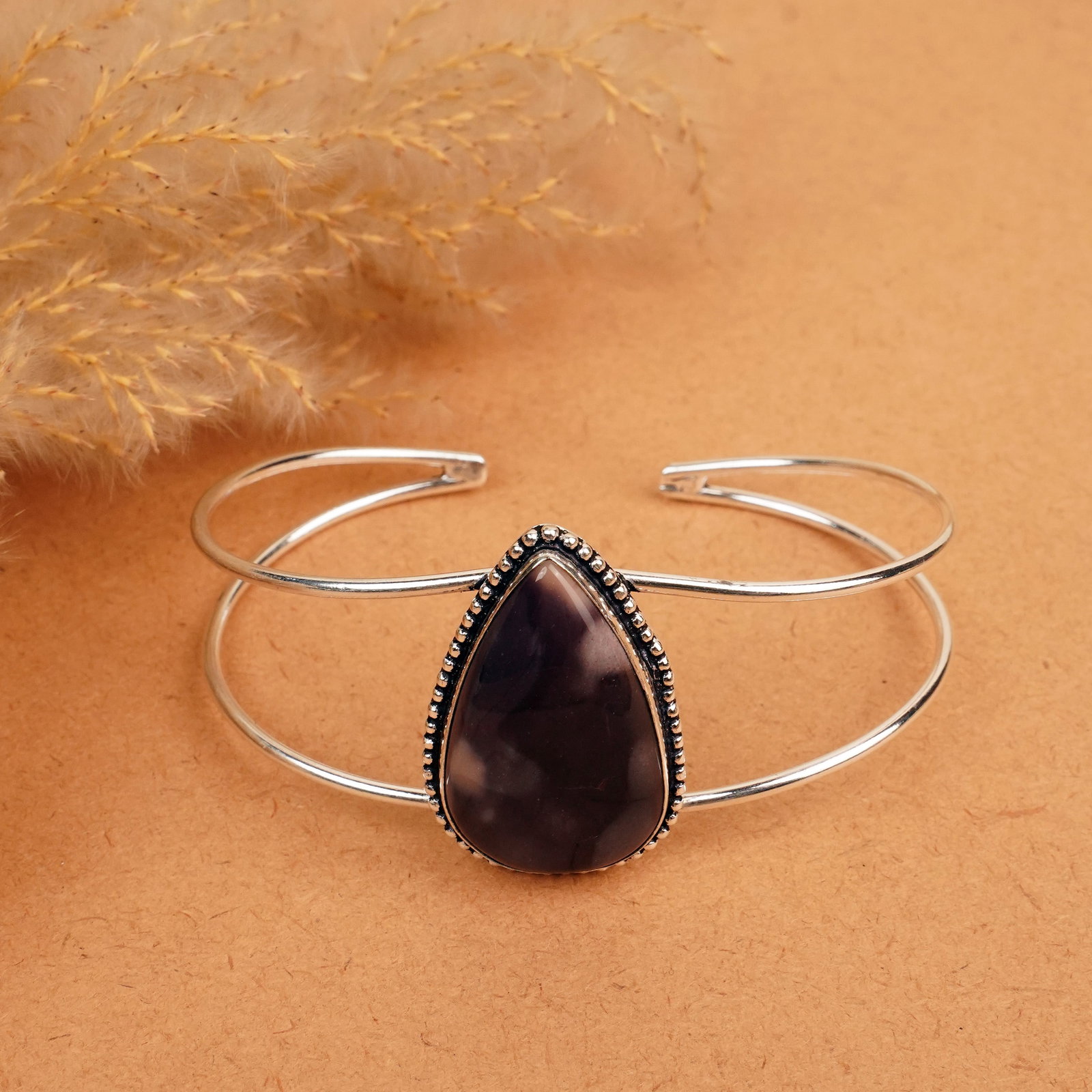 Natural Mookaite Jasper Silver Plated Handmade Cuff Bangle: Product ID: 260412113659 Product - Handmade Silver Plated Cuff Bangle Metal - 92.5 Sterling Silver Plated Bangle Size - 7x5.5 CM (Adjustable) Gemstone - Mookaite Jasper Gemstone Origin - Australia Gem
