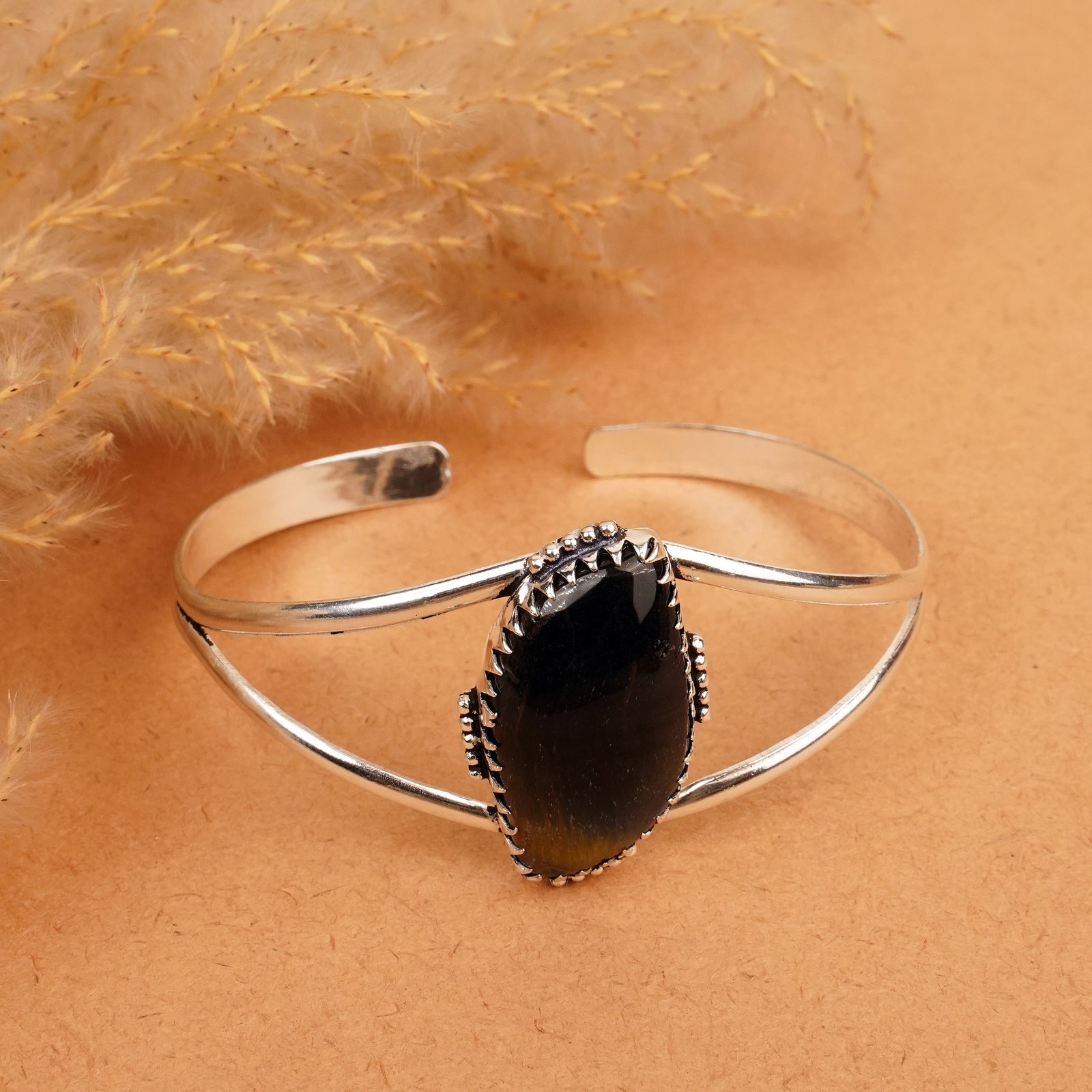 Natural Black Tiger Eye Silver Plated Handmade Cuff Bangle: Product ID: 260412113051 Product - Handmade Silver Plated Cuff Bangle Metal - 92.5 Sterling Silver Plated Bangle Size - 7x5.5 CM (Adjustable) Gemstone - Black Tiger Eye Gemstone Origin - South Africa 