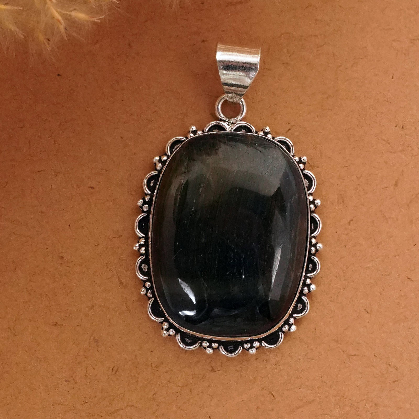 Natural Black Tiger Eye Silver Plated Handmade Pendant: Product ID: 260411140046 Product - Handmade Silver Plated Pendant Metal - 92.5 Sterling Silver Plated Pendant Size - 4x3 CM Gemstone - Black Tiger Eye Gemstone Origin - South Africa Gemstone Shape -Sq