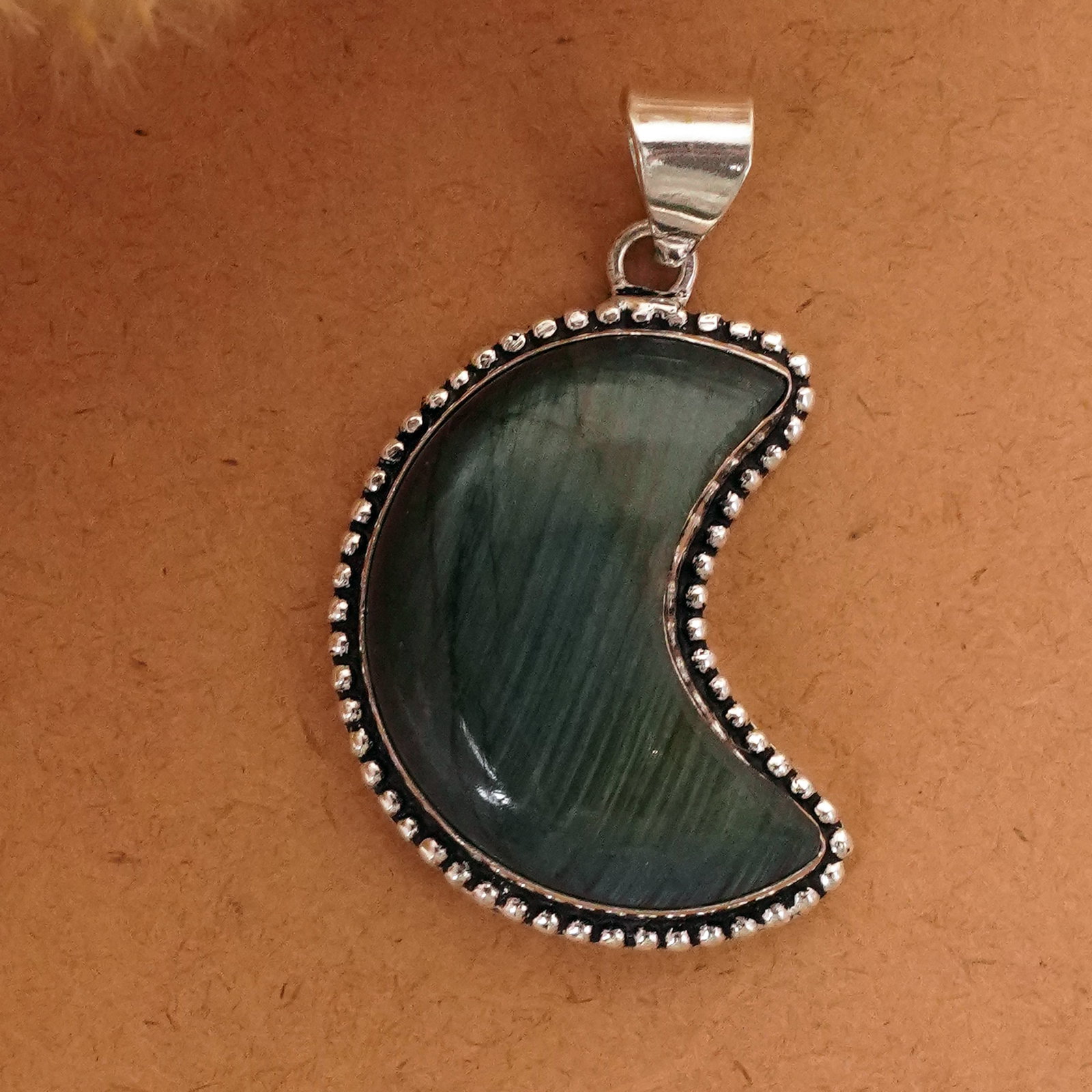 Natural Labradorite Silver Plated Handmade Moon Pendant: Product ID: 260411135724 Product - Handmade Silver Plated Pendant Metal - 92.5 Sterling Silver Plated Pendant Size - 3.5x2 CM Gemstone - Labradorite Gemstone Origin - Canada Gemstone Shape - Moon Pend