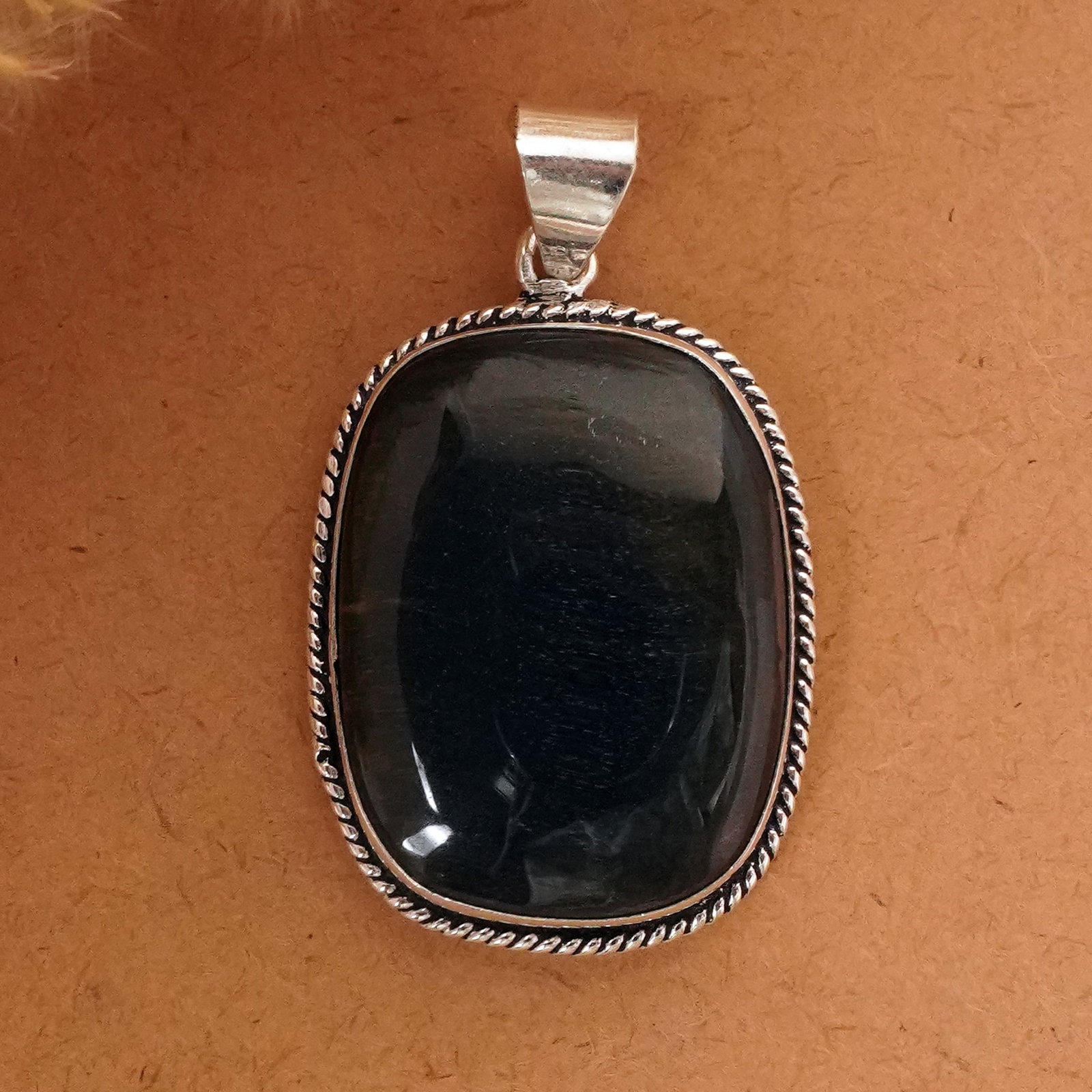 Natural Black Tiger Eye Silver Plated Handmade Pendant: Product ID: 260411135601 Product - Handmade Silver Plated Pendant Metal - 92.5 Sterling Silver Plated Pendant Size - 3.5x3 CM Gemstone - Black Tiger Eye Gemstone Origin - South Africa Gemstone Shape -