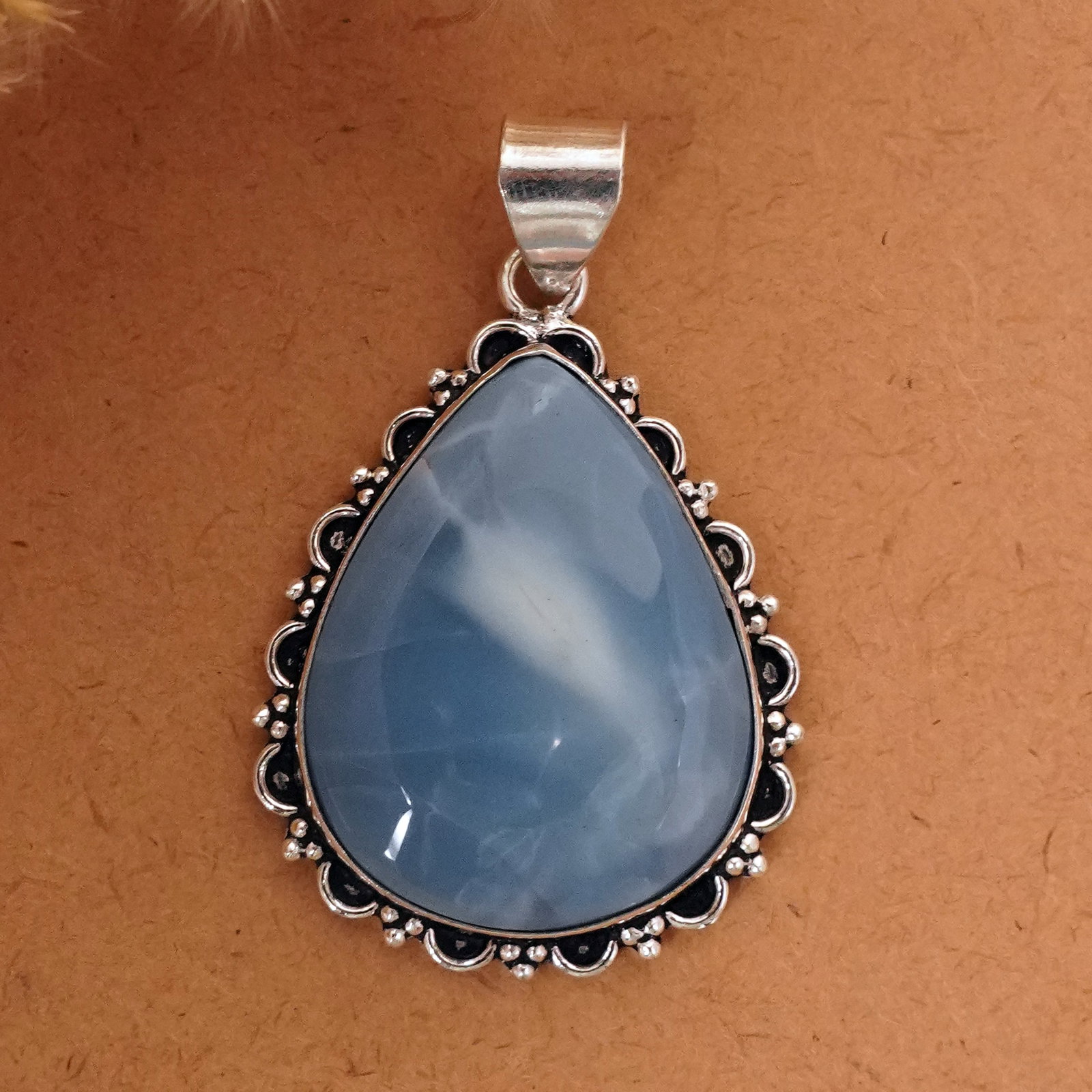 Natural Blue Opal Silver Plated Handmade Pendant: Product ID: 260411135340 Product - Handmade Silver Plated Pendant Metal - 92.5 Sterling Silver Plated Pendant Size - 4x3 CM Gemstone - Blue Opal Gemstone Origin - Indonesia Gemstone Shape - Pear Penda