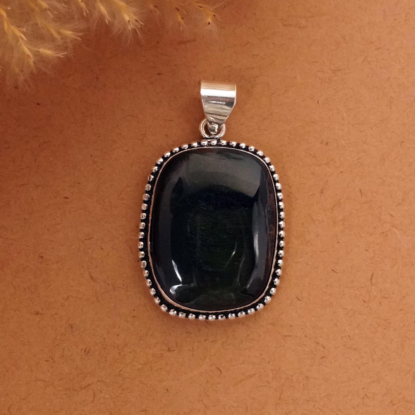 Natural Black Tiger Eye Silver Plated Handmade Pendant: Product ID: 260411135031 Product - Handmade Silver Plated Pendant Metal - 92.5 Sterling Silver Plated Pendant Size - 3.5x3 CM Gemstone - Black Tiger Eye Gemstone Origin - South Africa Gemstone Shape -