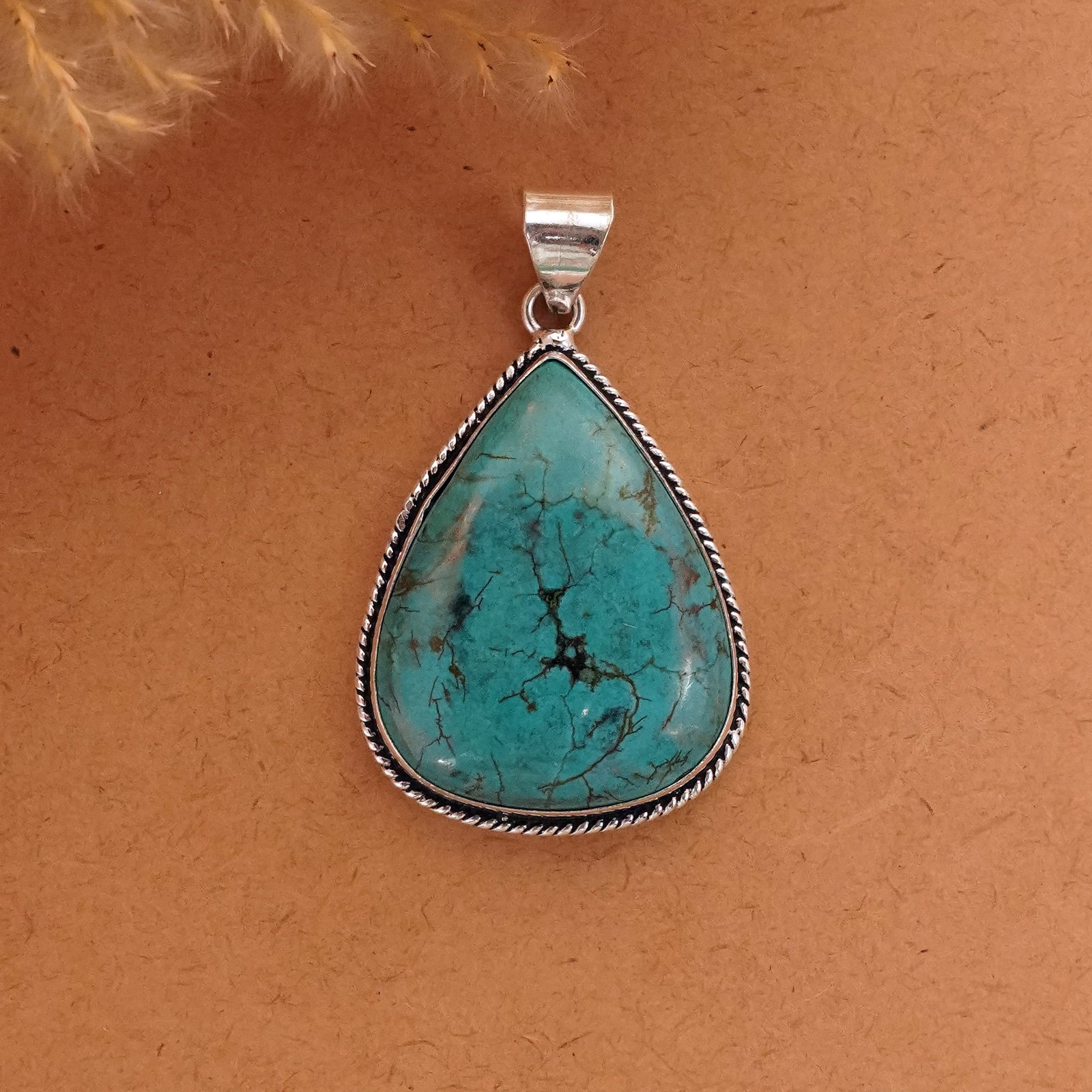 Natural Turquoise Silver Plated Handmade Pendant: Product ID: 260411134809 Product - Handmade Silver Plated Pendant Metal - 92.5 Sterling Silver Plated Pendant Size - 4x3 CM Gemstone - Turquoise Gemstone Origin - Tibet Gemstone Shape - Pear Pendant W