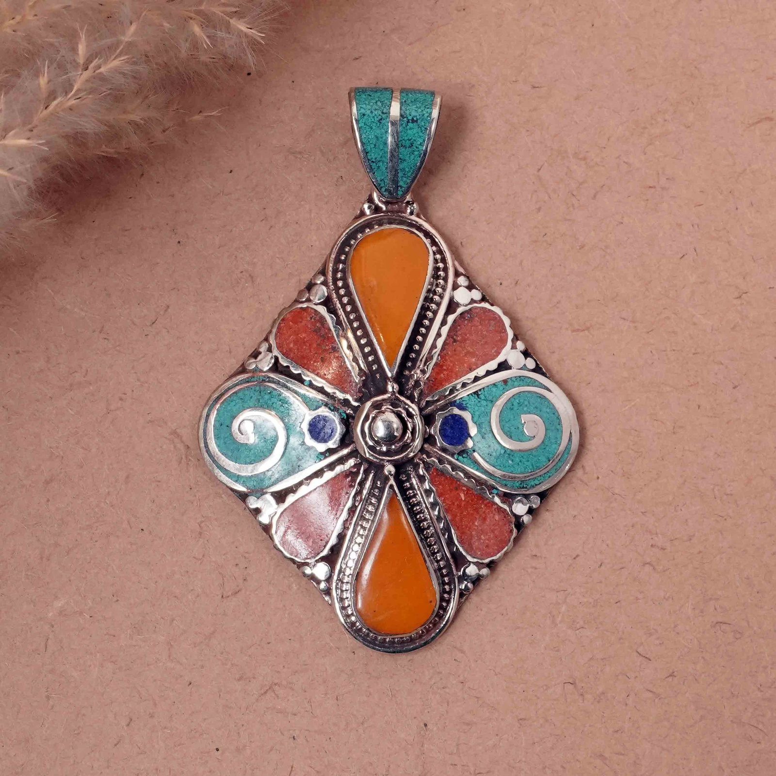 Tibetan Turquoise & Coral Handmade Ethnic Boho Pendant: Product ID: 260417145401 Product - Tibetan Natural Handmade Pendant Gemstone - Natural Turquoise & Coral & Copal & Lapis Pendant Size - 6X5 CM Pendant Weight - 24 Gram Metal - Brass & Copper mix