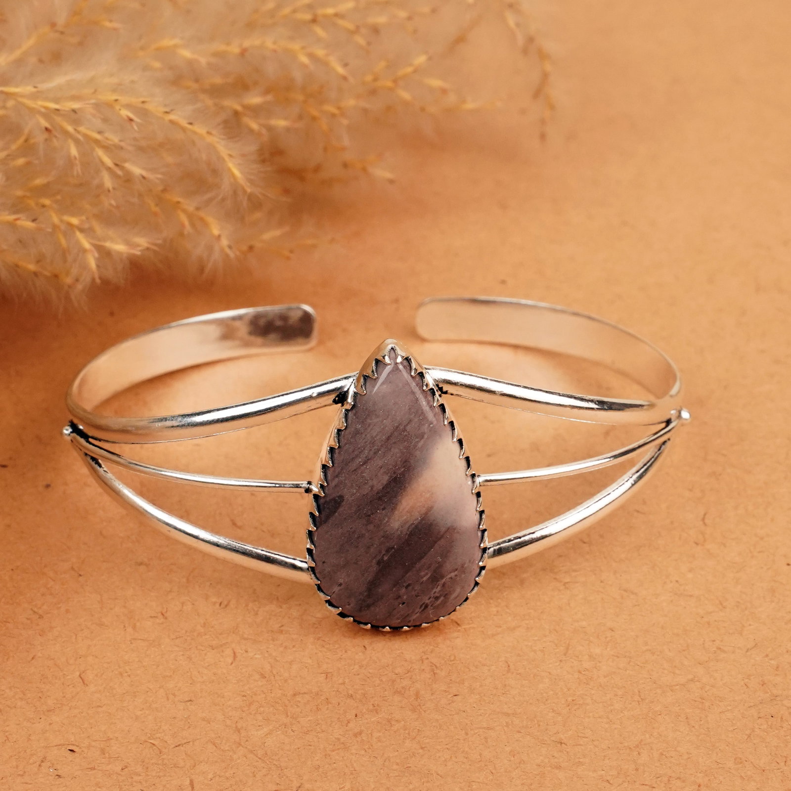 Natural Mookaite Jasper Silver Plated Handmade Cuff Bangle: Product ID: 260412131932 Product - Handmade Silver Plated Cuff Bangle Metal - 92.5 Sterling Silver Plated Bangle Size - 7.5x5.5 CM (Adjustable) Gemstone - Mookaite Jasper Gemstone Origin - Australia G