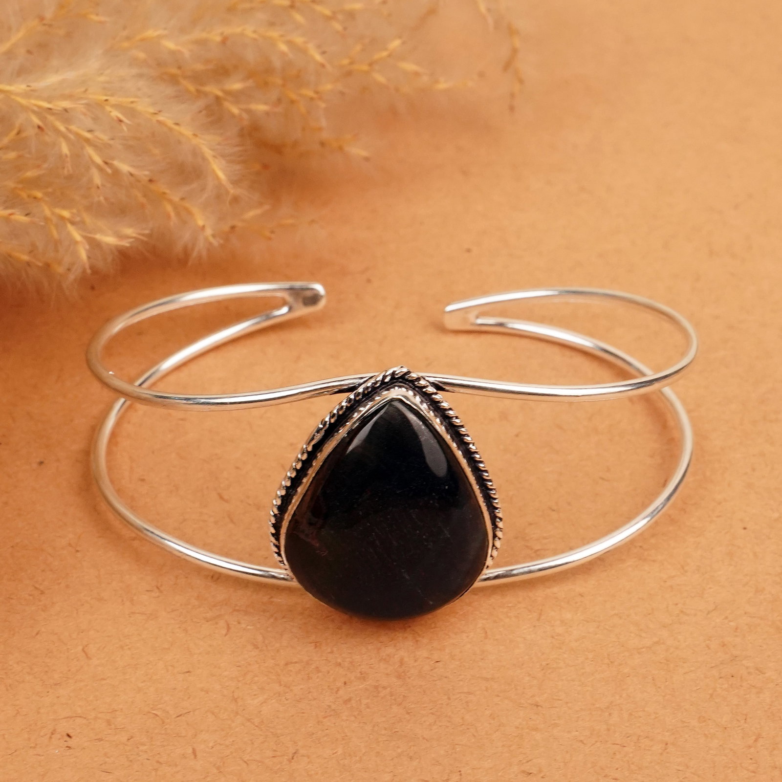 Natural Black Tiger Eye Silver Plated Handmade Cuff Bangle: Product ID: 260412131712 Product - Handmade Silver Plated Cuff Bangle Metal - 92.5 Sterling Silver Plated Bangle Size - 7.5x5.5 CM (Adjustable) Gemstone - Black Tiger Eye Gemstone Origin - South