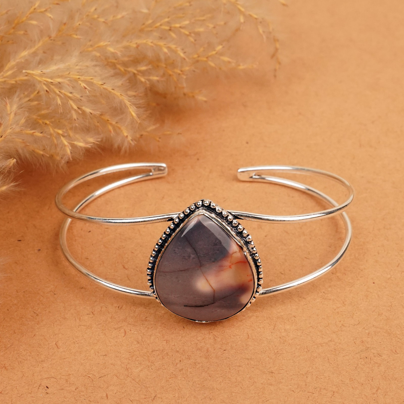 Natural Mookaite Jasper Silver Plated Handmade Cuff Bangle: Product ID: 260412130943 Product - Handmade Silver Plated Cuff Bangle Metal - 92.5 Sterling Silver Plated Bangle Size - 7.5x5.5 CM (Adjustable) Gemstone -Mookaite Jasper Gemstone Origin - Australia Ge