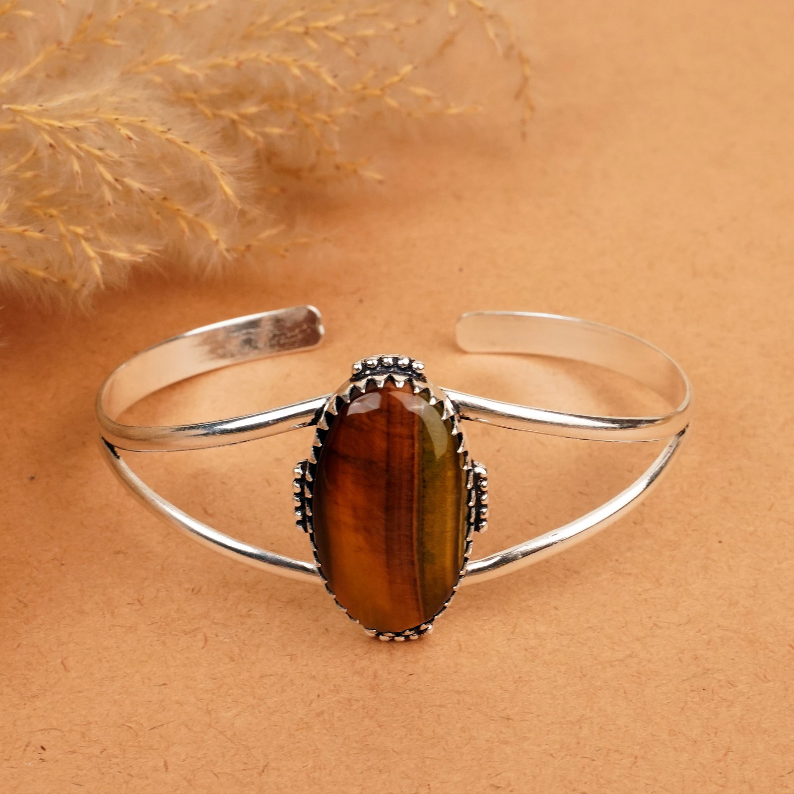 Natural Tiger Eye Silver Plated Handmade Cuff Bangle: Product ID: 260412130829 Product - Handmade Silver Plated Cuff Bangle Metal - 92.5 Sterling Silver Plated Bangle Size - 7.5x5.5 CM (Adjustable) Gemstone -Tiger Eye Gemstone Origin - South Africa