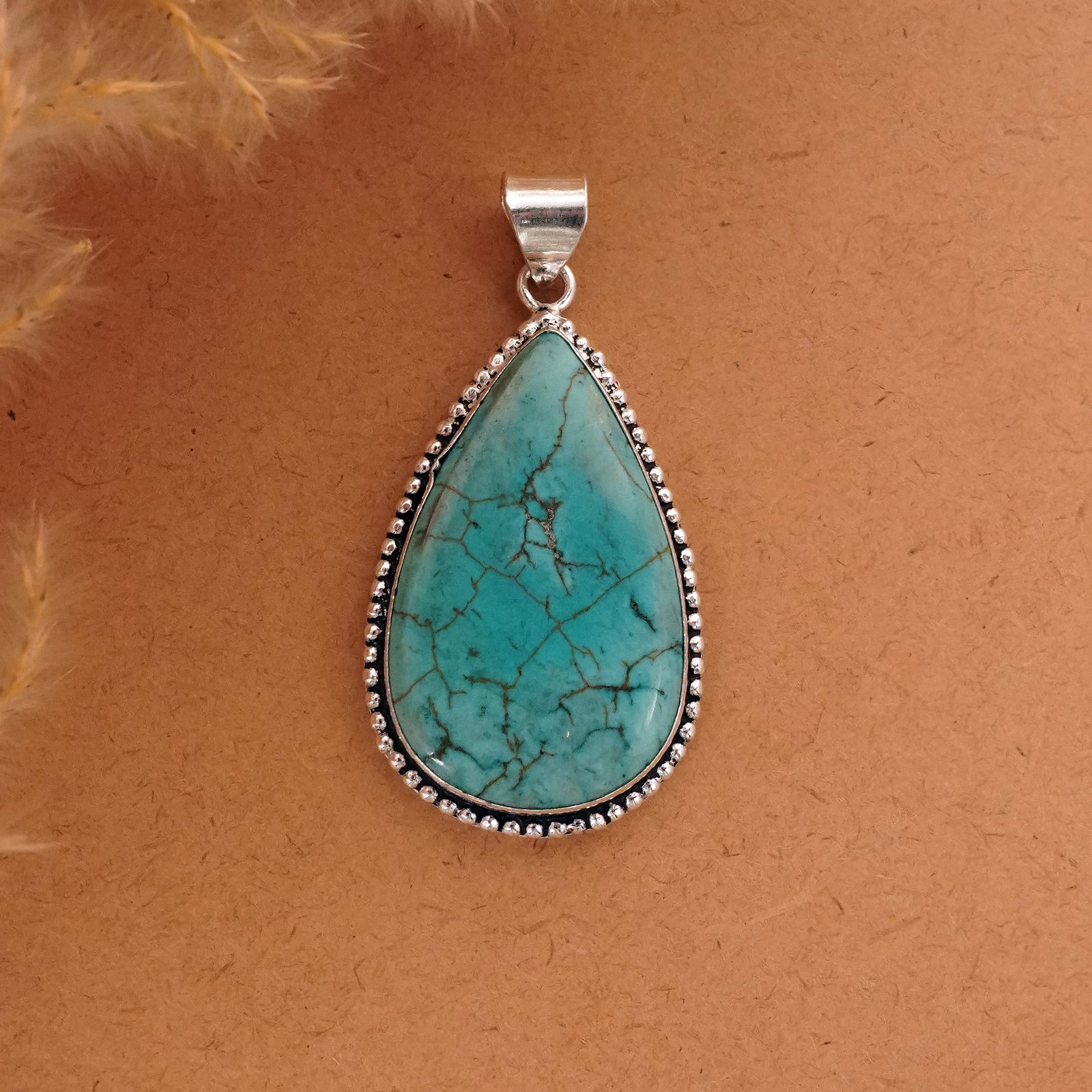 Natural Turquoise Silver Plated Handmade Pendant: Product ID: 260411122707 Product - Handmade Silver Plated Pendant Metal - 92.5 Sterling Silver Plated Pendant Size - 4.5x3 CM Gemstone - Turquoise Gemstone Origin - Tibet Gemstone Shape - Pear