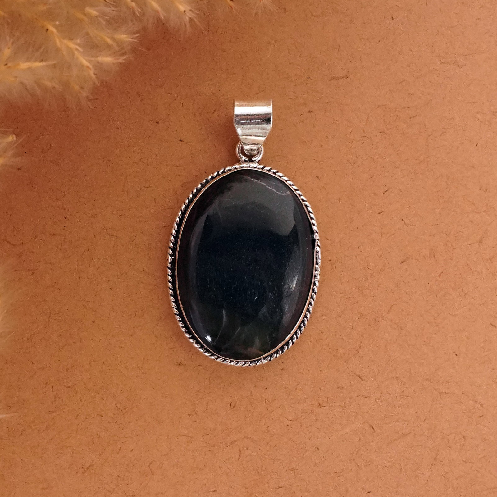 Natural Black Tiger Eye Silver Plated Handmade Pendant: Product ID: 260411122601 Product - Handmade Silver Plated Pendant Metal - 92.5 Sterling Silver Plated Pendant Size - 4.5x3 CM Gemstone - Black Tiger Eye Gemstone Origin - South Africa Gemstone Shape -