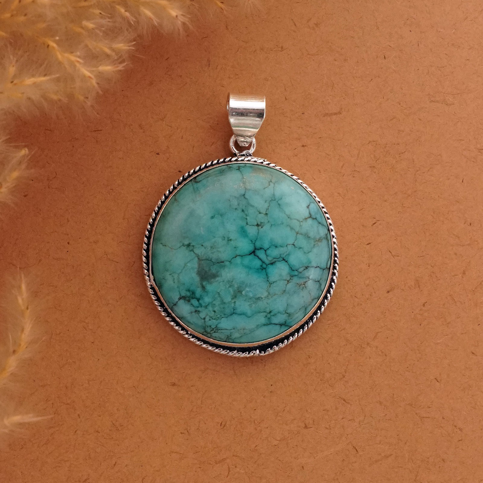 Natural Turquoise Silver Plated Handmade Pendant: Product ID: 260411122317 Product - Handmade Silver Plated Pendant Metal - 92.5 Sterling Silver Plated Pendant Size - 4 CM Gemstone - Turquoise Gemstone Origin - Tibet Gemstone Shape - Round Pendant We