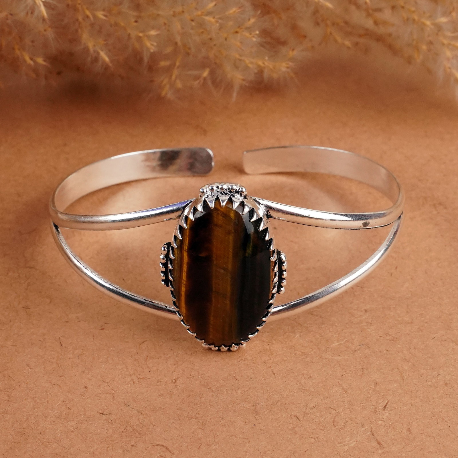 Natural Tiger Eye Silver Plated Handmade Cuff Bangle: Product ID: 260408142800 Product - Handmade Silver Plated Cuff Bangle Metal - 92.5 Sterling Silver Plated Bangle Size - 7x5 CM (Adjustable) Gemstone - Tiger Eye Gemstone Origin - South Africa Gemstone