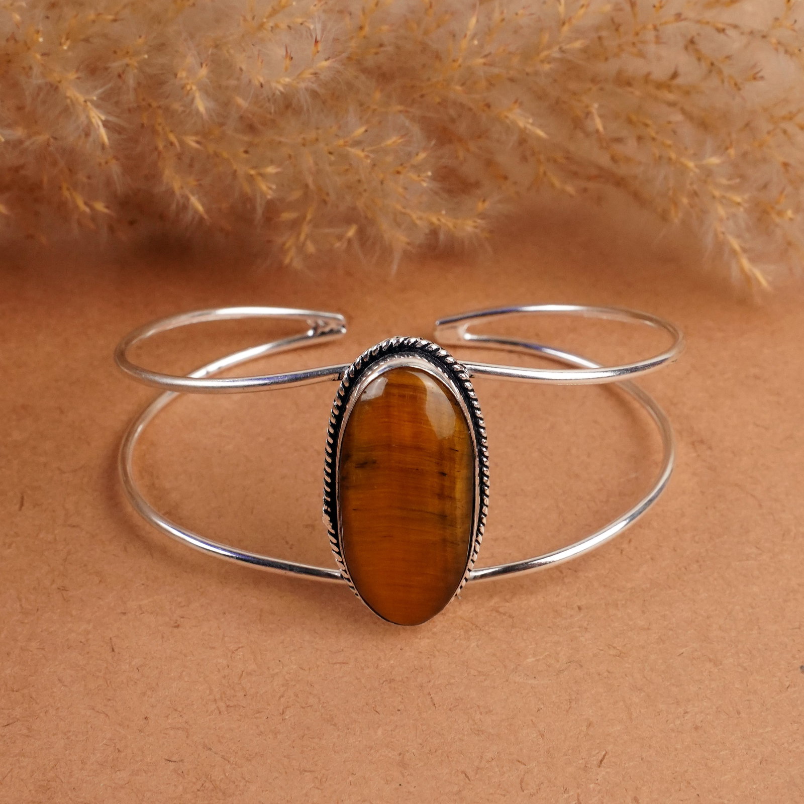 Natural Tiger Eye Silver Plated Handmade Cuff Bangle: Product ID: 260408142633 Product - Handmade Silver Plated Cuff Bangle Metal - 92.5 Sterling Silver Plated Bangle Size - 7.5x5.5 CM (Adjustable) Gemstone - Tiger Eye Gemstone Origin - South Africa Gems