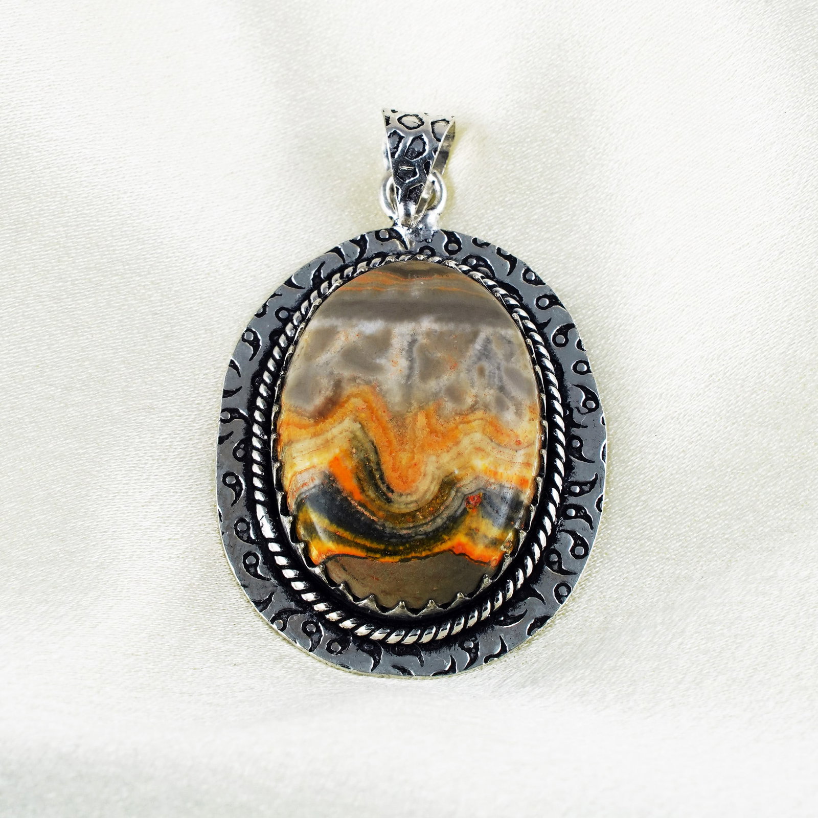 Natural Picture Jasper Silver Plated Handmade Pendant: Product ID: 260401133001 Product - Handmade Silver Plated Pendant Metal - 92.5 Sterling Silver Plated Pendant Size - 3.5x3 CM Gemstone - Picture Jasper Gemstone Origin - Indonesia Gemstone Shape - Ova