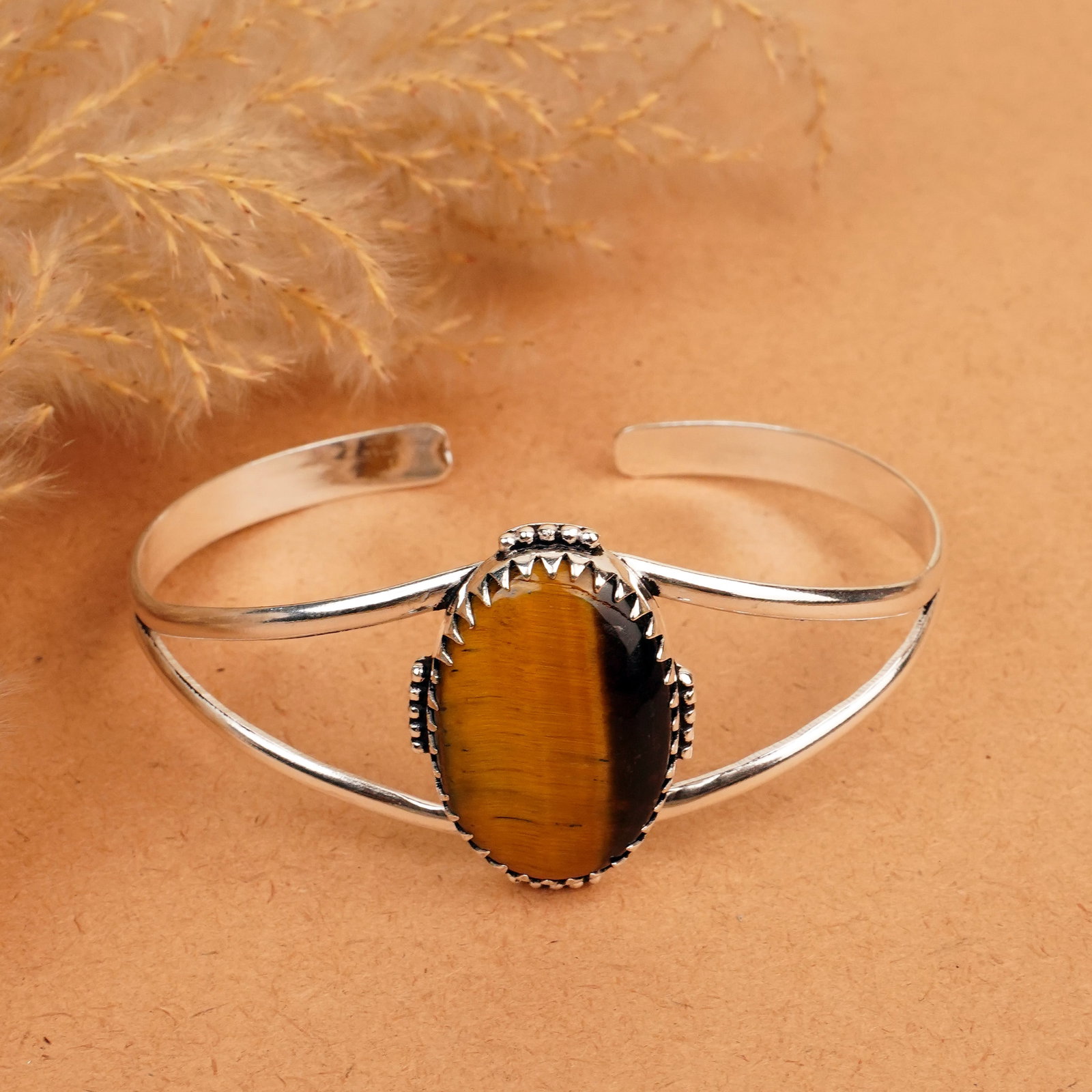 Natural Tiger Eye Silver Plated Handmade Cuff Bangle: Product ID: 260412130030 Product - Handmade Silver Plated Cuff Bangle Metal - 92.5 Sterling Silver Plated Bangle Size - 7.5x5.5 CM (Adjustable) Gemstone -Tiger Eye Gemstone Origin - South Africa Gemst