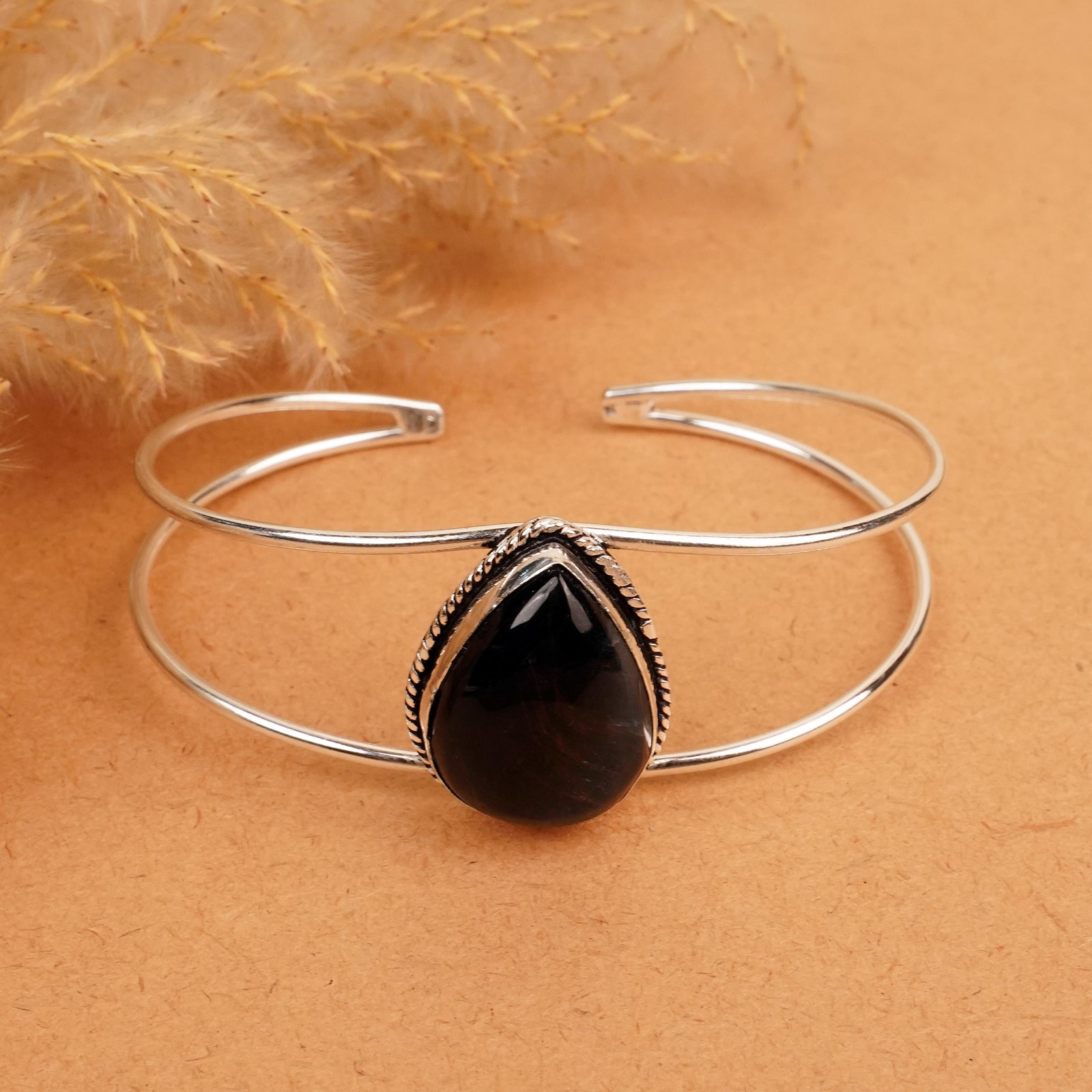 Natural Black Tiger Eye Silver Plated Handmade Cuff Bangle: Product ID: 260412125750 Product - Handmade Silver Plated Cuff Bangle Metal - 92.5 Sterling Silver Plated Bangle Size - 7.5x5.5 CM (Adjustable) Gemstone - Black Tiger Eye Gemstone Origin - South Afric