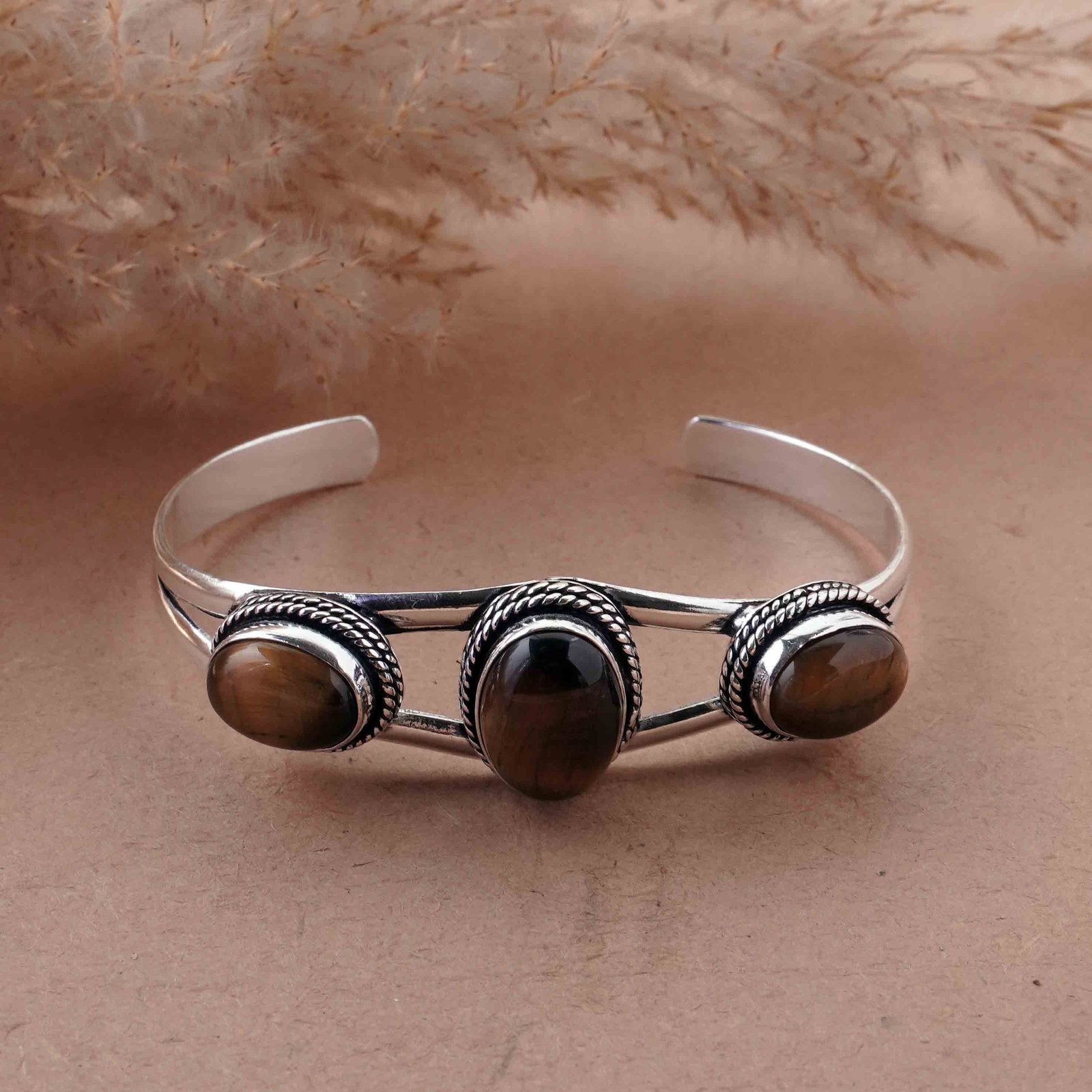 Natural Tiger Eye Silver Plated Handmade Cuff Bangle: Product ID: 260429154514 Product - Handmade Silver Plated Cuff Bangle Metal - 92.5 Sterling Silver Plated Bangle Size - 6.5x4.5 CM (Adjustable) Gemstone - Tiger Eye Gemstone Origin - South Africa Gems
