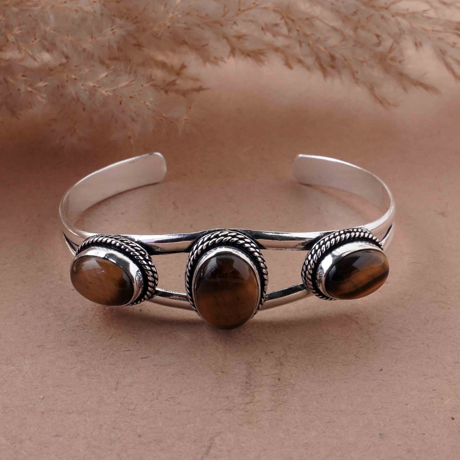 Natural Tiger Eye Silver Plated Handmade Cuff Bangle: Product ID: 260429153944 Product - Handmade Silver Plated Cuff Bangle Metal - 92.5 Sterling Silver Plated Bangle Size - 6.5x4.5 CM (Adjustable) Gemstone - Tiger Eye Gemstone Origin - South Africa Gems