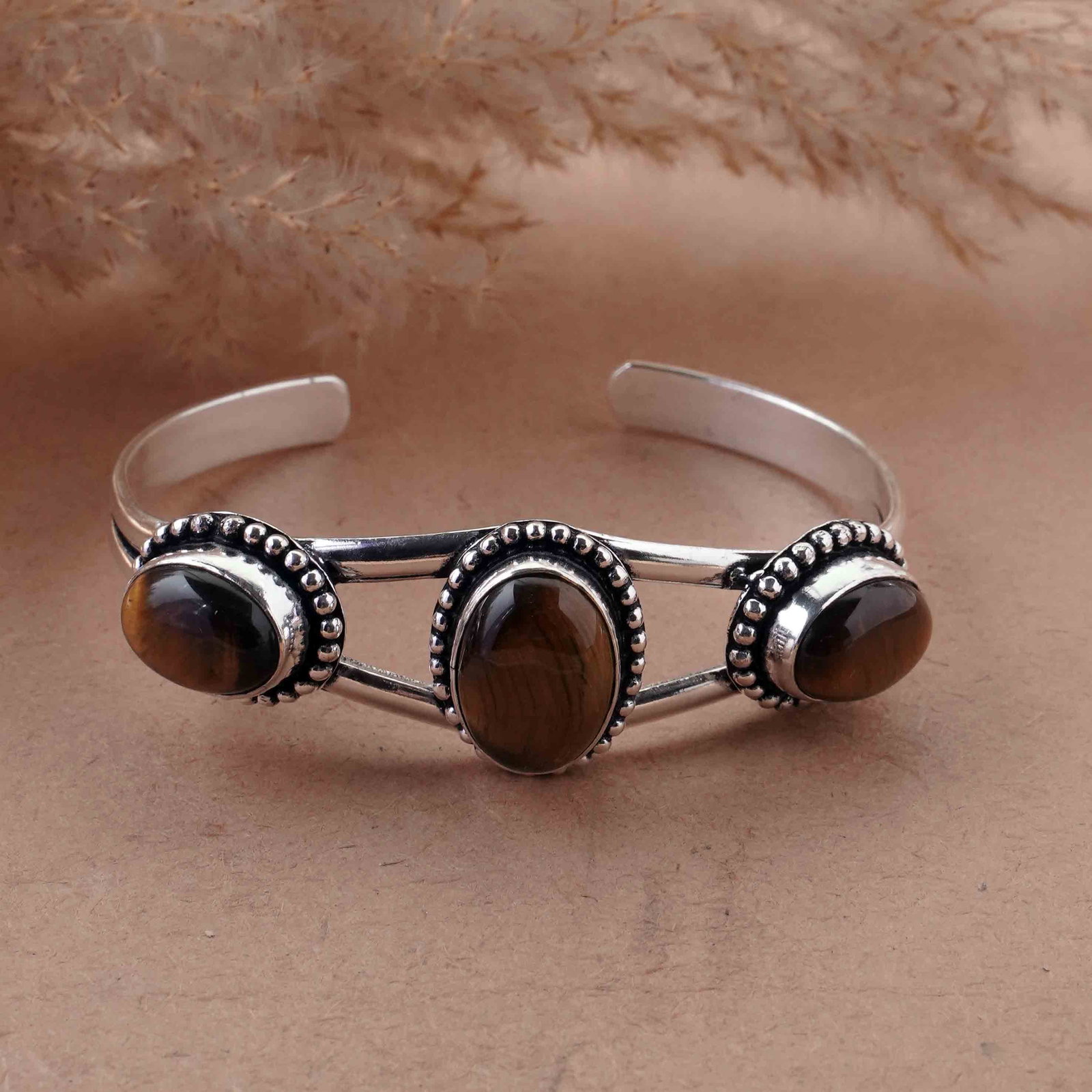 Natural Tiger Eye Silver Plated Handmade Cuff Bangle: Product ID: 260429153526 Product - Handmade Silver Plated Cuff Bangle Metal - 92.5 Sterling Silver Plated Bangle Size - 6.5x4.5 CM (Adjustable) Gemstone - Tiger Eye Gemstone Origin - South Africa Gems