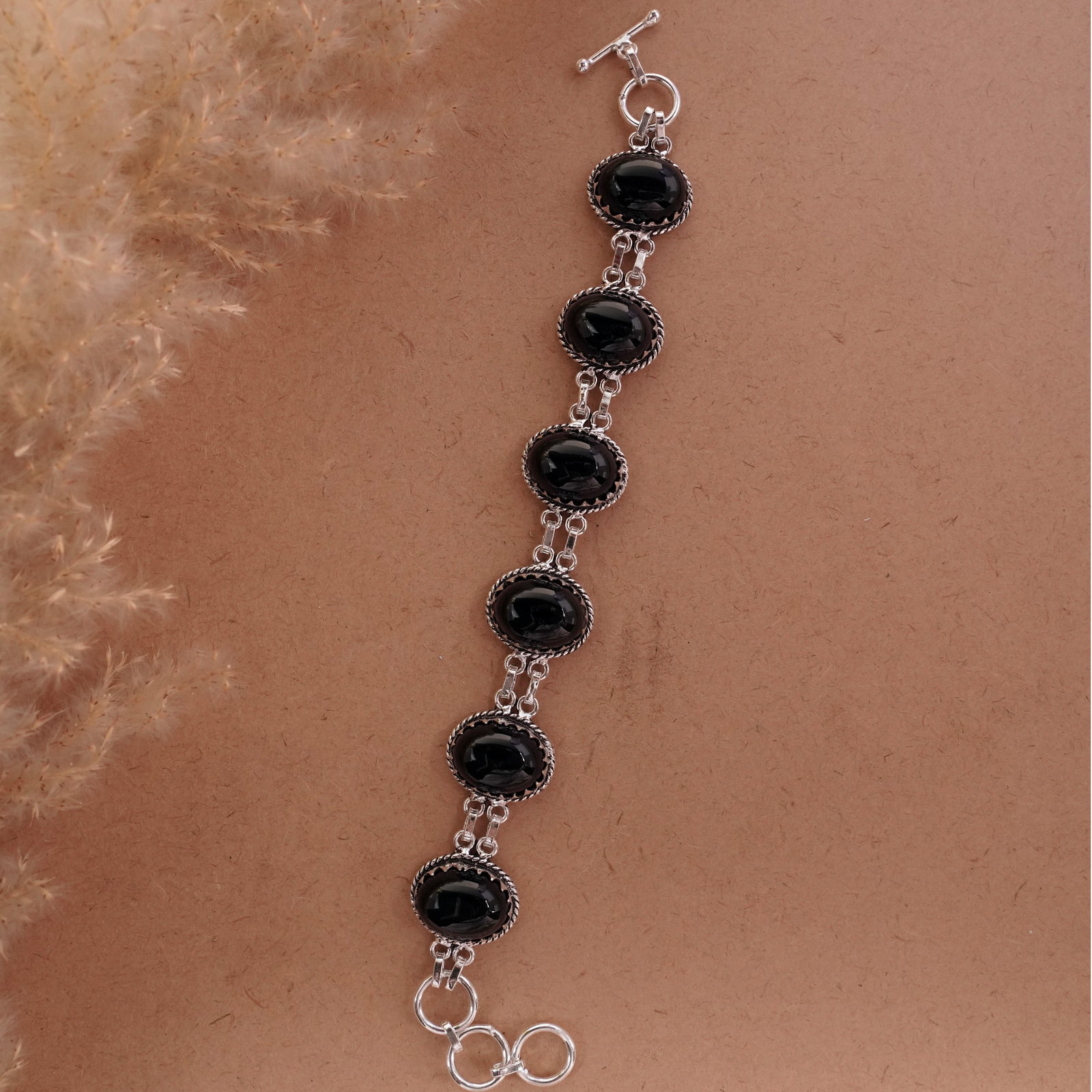 Natural Black Onyx 92.5 Silver Plated Handmade Bracelet: Product ID: 260501133758 Product - Handmade Silver Plated Bracelet Metal - 92.5 Sterling Silver Plated Bracelet Length - 6 Inch + 2 Inch Gemstone - Black Onyx Gemstone Size -12X16 ( 6 Stone) Gemstone 
