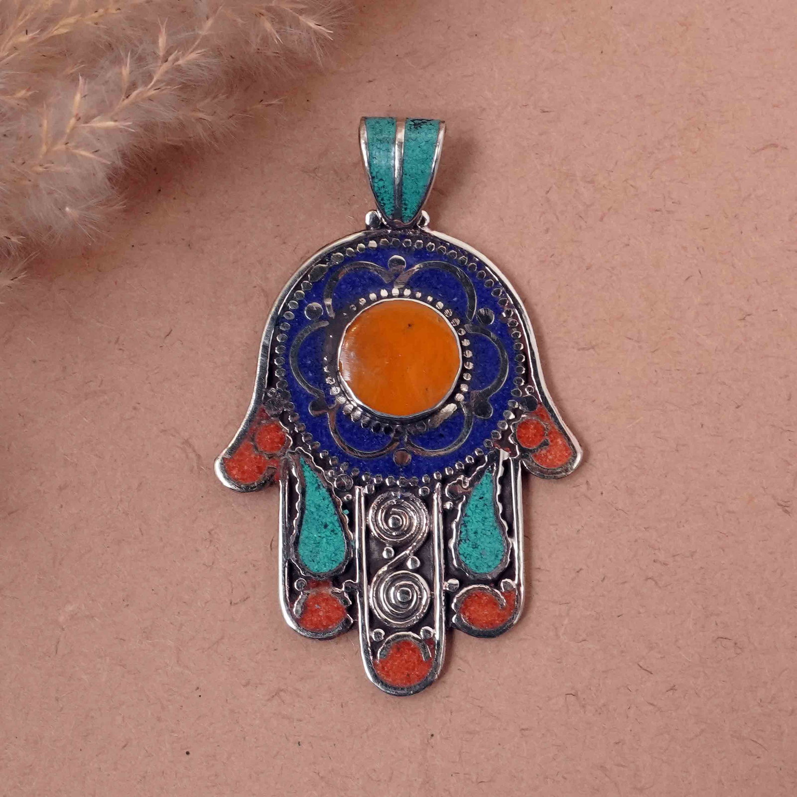Tibetan Turquoise & Coral Handmade Fatima Hand Pendant: Product ID: 260417142422 Product - Tibetan Handmade Ethnic Pendant Gemstone - Natural Turquoise & Coral & Copal & Lapis Pendant Size - 6.5X4.5 CM Pendant Weight - 24 Gram Metal - Brass & Copper mix Me