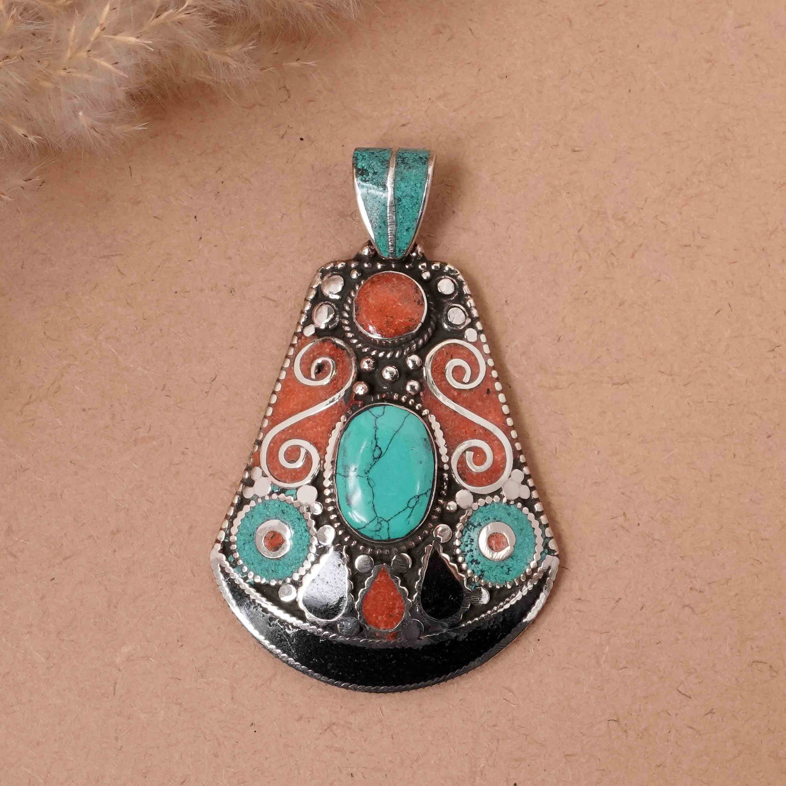 Tibetan Turquoise & Coral Handmade Asian Bold Pendant: Product ID: 260417142102 Product - Tibetan Handmade Ethnic Pendant Gemstone - Natural Turquoise & Coral & Black Onyx Pendant Size - 6X4.5 CM Pendant Weight - 26 Gram Metal - Brass & Copper mix Metal O