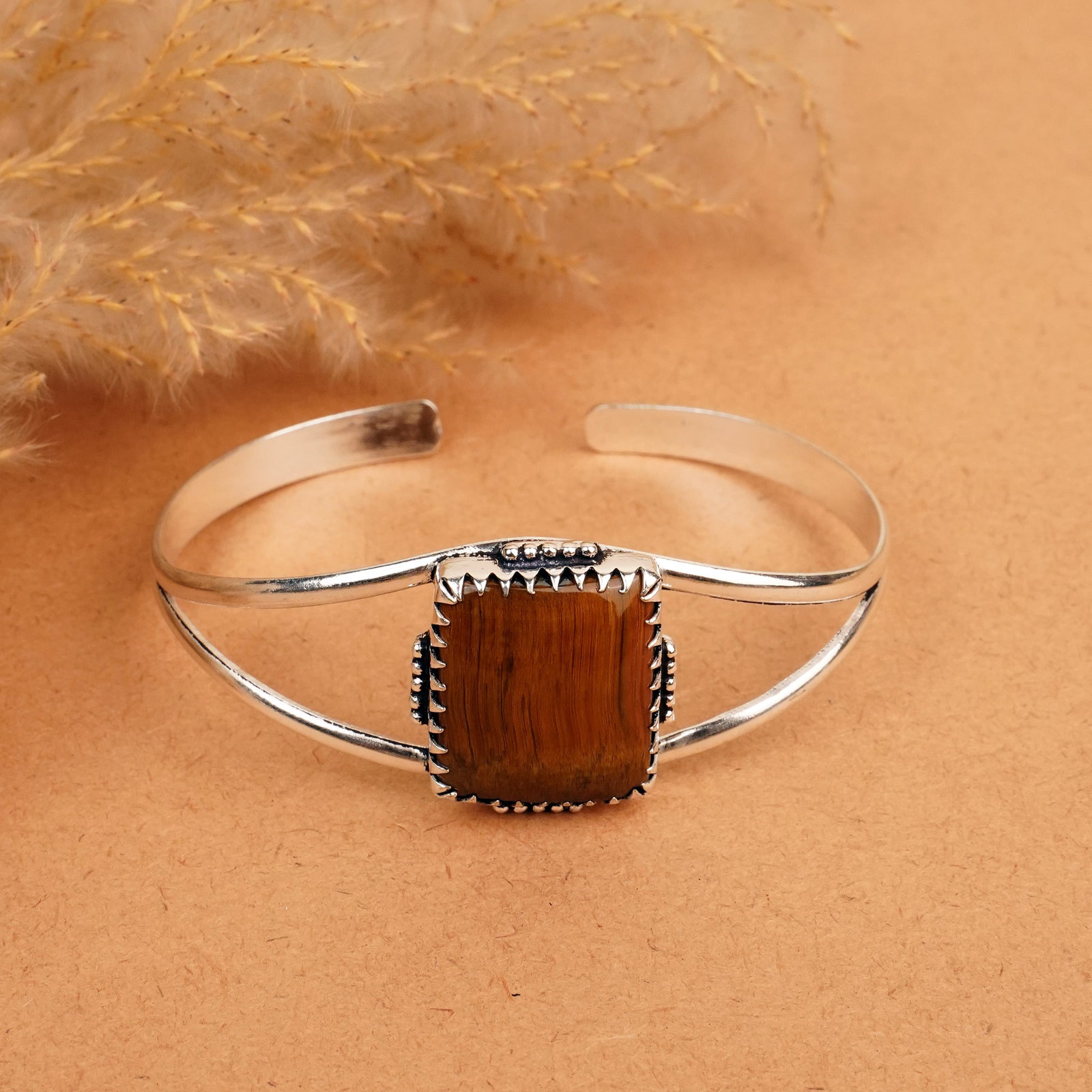 Natural Tiger Eye Silver Plated Handmade Cuff Bangle: Product ID: 260412115838 Product - Handmade Silver Plated Cuff Bangle Metal - 92.5 Sterling Silver Plated Bangle Size - 7.5x5.5 CM (Adjustable) Gemstone - Tiger Eye Gemstone Origin - South Africa Gems