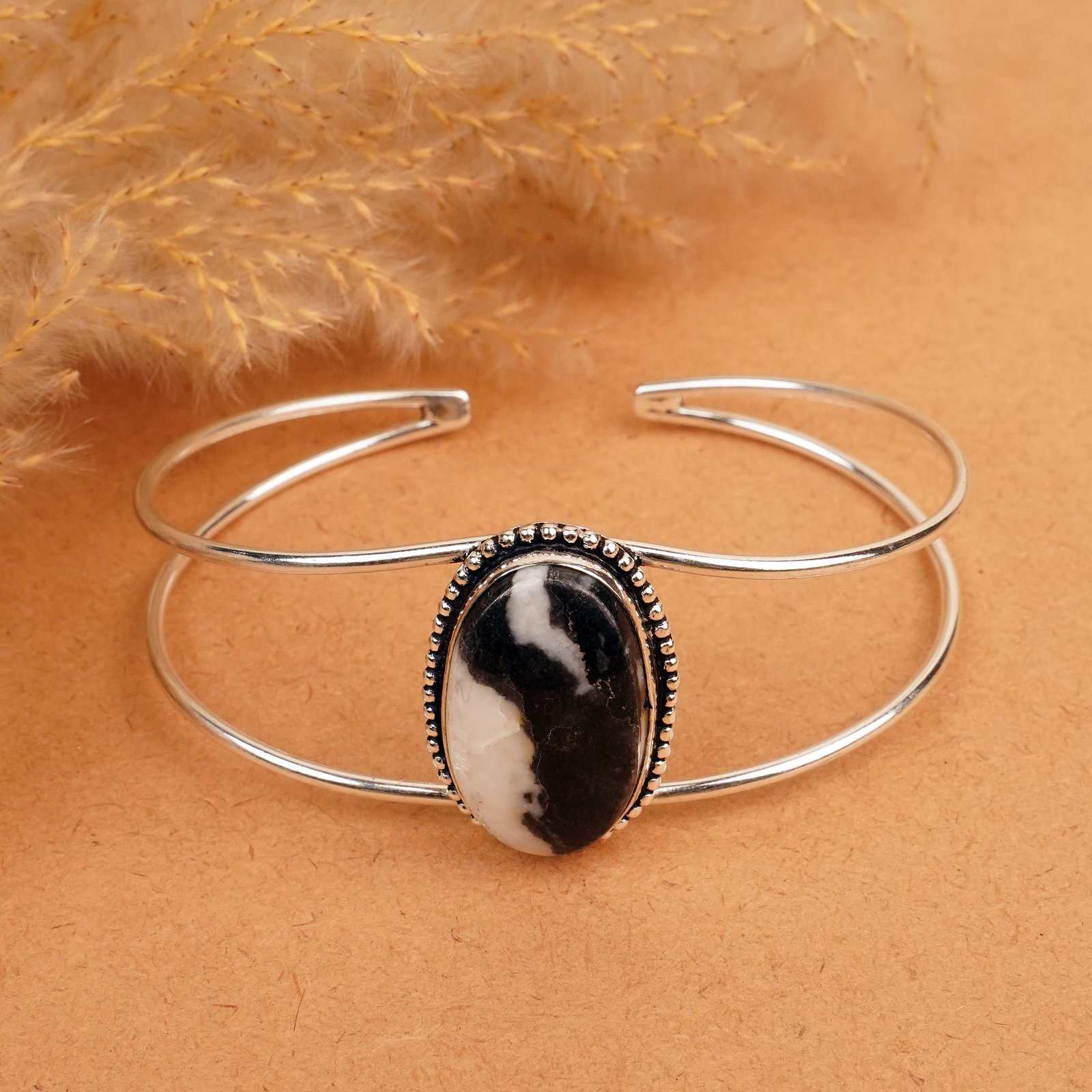 Natural Zebra Jasper Silver Plated Handmade Cuff Bangle: Product ID: 260412112639 Product - Handmade Silver Plated Cuff Bangle Metal - 92.5 Sterling Silver Plated Bangle Size - 7.5x5.5 CM (Adjustable) Gemstone - Zebra Jasper Gemstone Origin - Africa Gemston