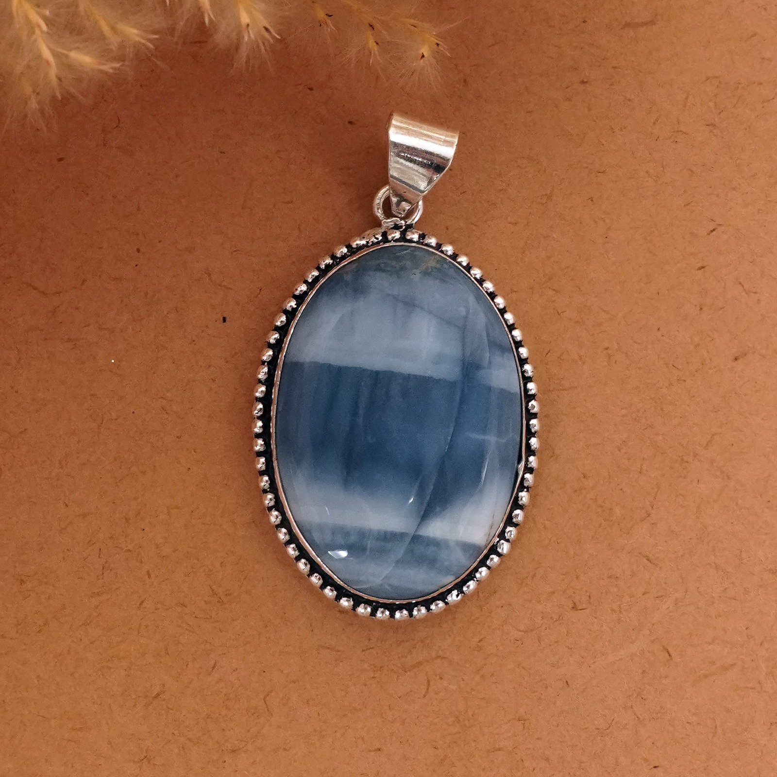 Natural Blue Opal Sterling Silver Plated Handmade Pendant: Product ID: 260411134217 Product - Handmade Silver Plated Pendant Metal - 92.5 Sterling Silver Plated Pendant Size - 4x3 CM Gemstone - Blue Opal Gemstone Origin - Indonesia Gemstone Shape - Oval Penda