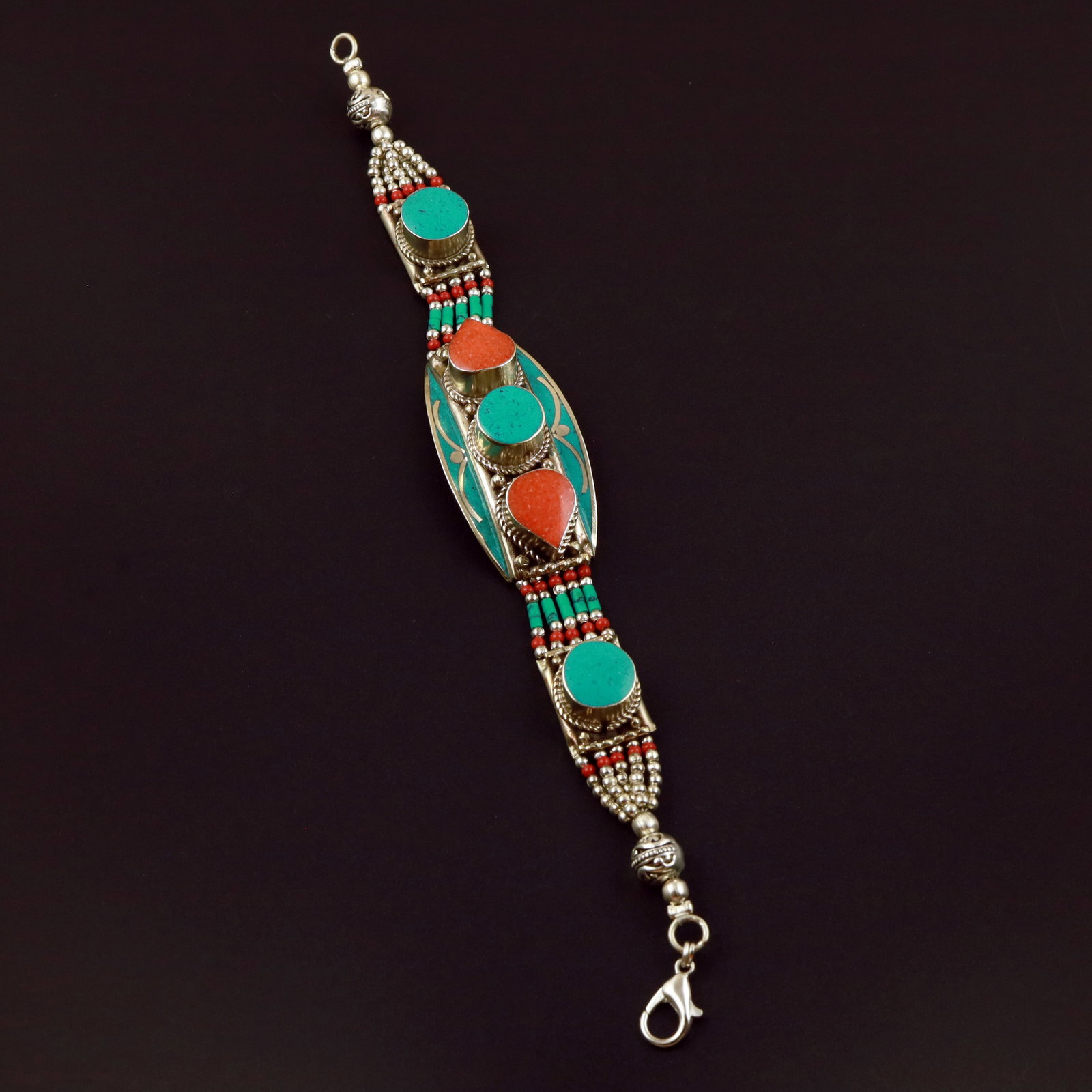 Tibetan Turquoise & Coral Handmade Royal Bracelet: Product ID: 260513130957 Product - Tibetan Handmade Ethnic Bracelet Gemstone - Natural Turquoise & Coral Size - 7 Inch Weight - 50 Gram Approx Metal - Brass & Copper mix Metal Origin - Nepal Country/R