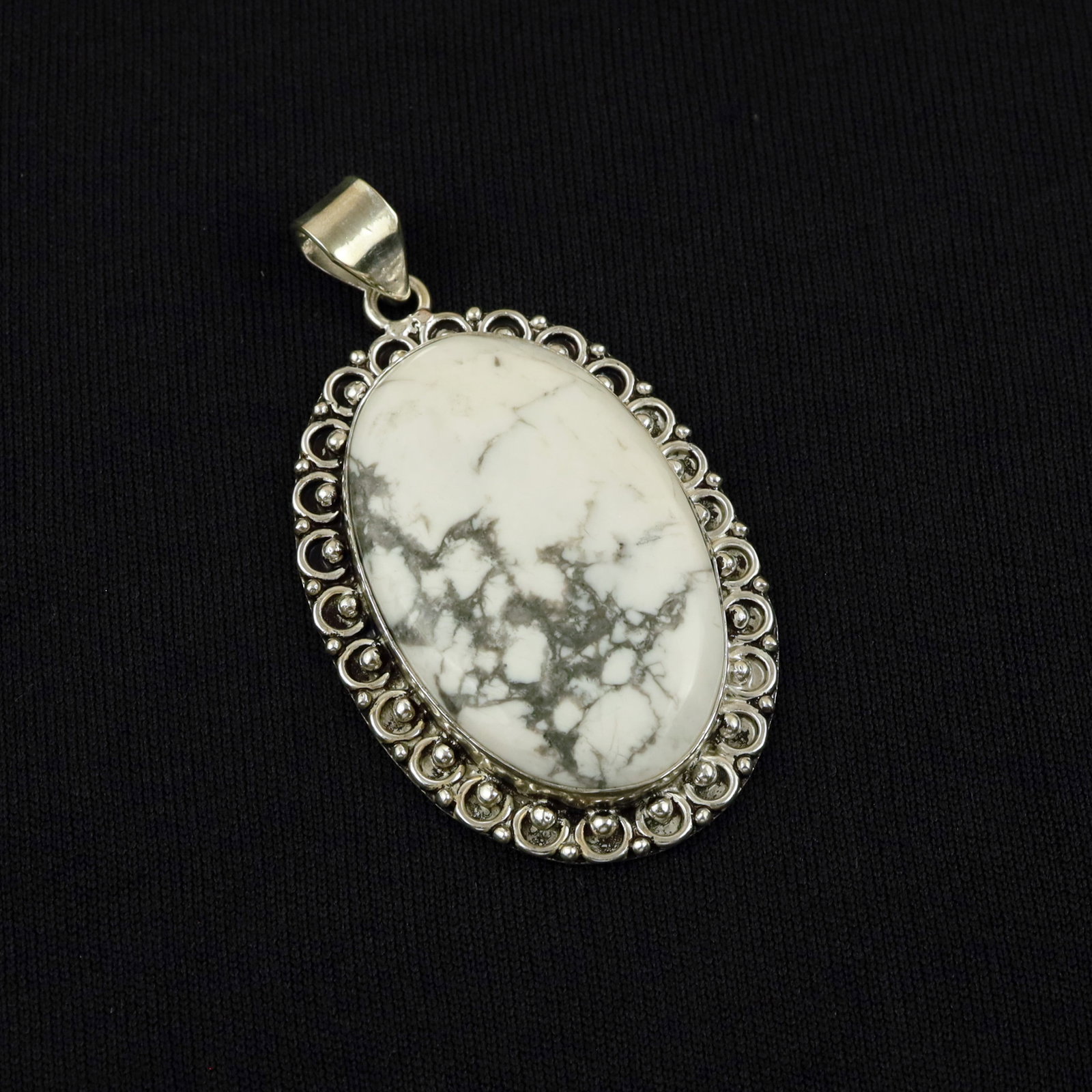 Natural Howlite Silver Plated Handmade Pendant: Product ID: 260513105346 Product - Handmade Silver Plated Pendant Metal - 92.5 Sterling Silver Plated Pendant Size - 5x3.5 CM Gemstone - Howlite Gemstone Origin - Canada Gemstone Shape - Oval Pendant 