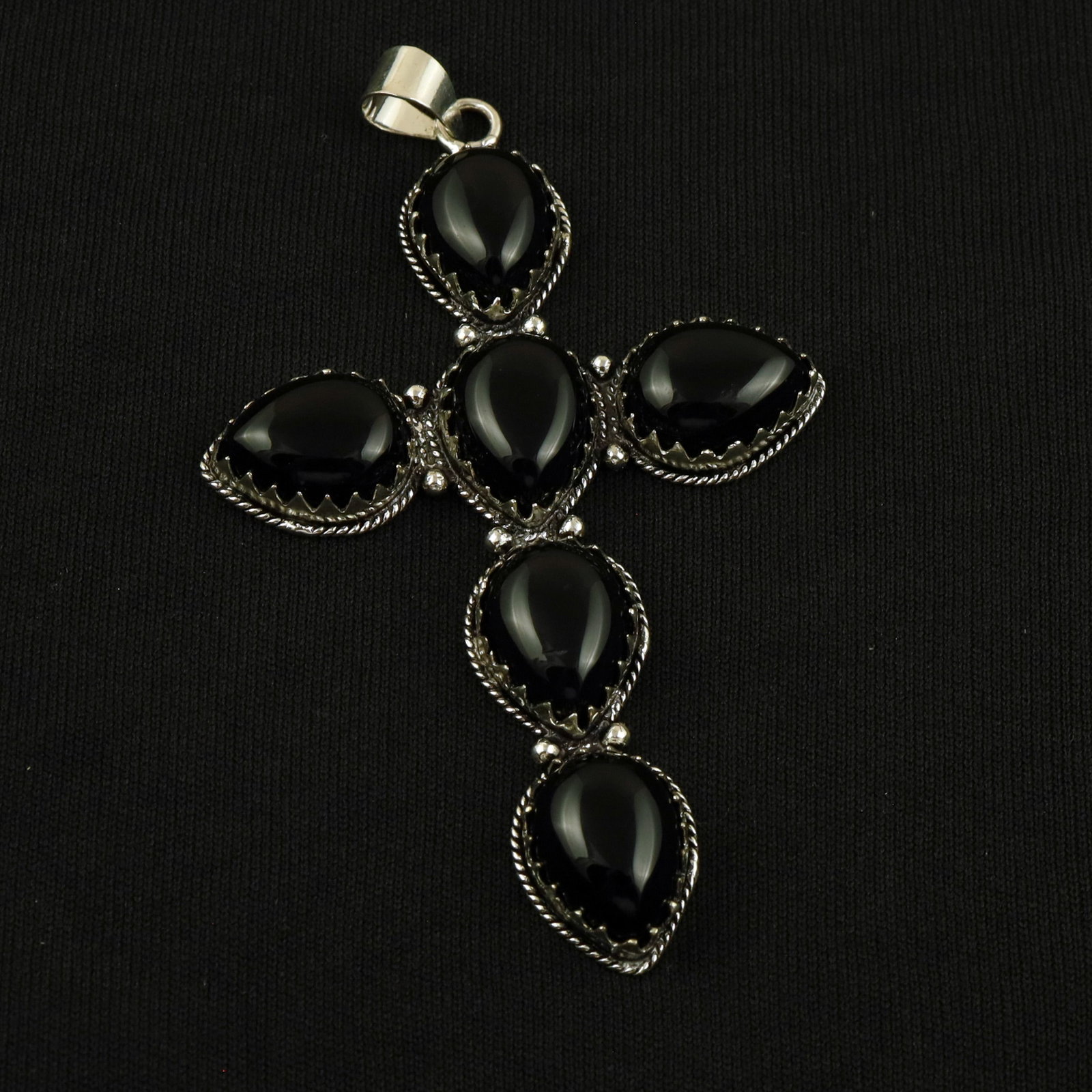 Natural Balck Onyx Silver Plated Handmade Cross Pendant: Product ID: 260512164908 Product - Handmade Silver Plated Pendant Metal - 92.5 Sterling Silver Plated Pendant Size - 3x2 Inch Gemstone - Balck Onyx Gemstone Origin - India Gemstone Size - 12X16 MM ( 6