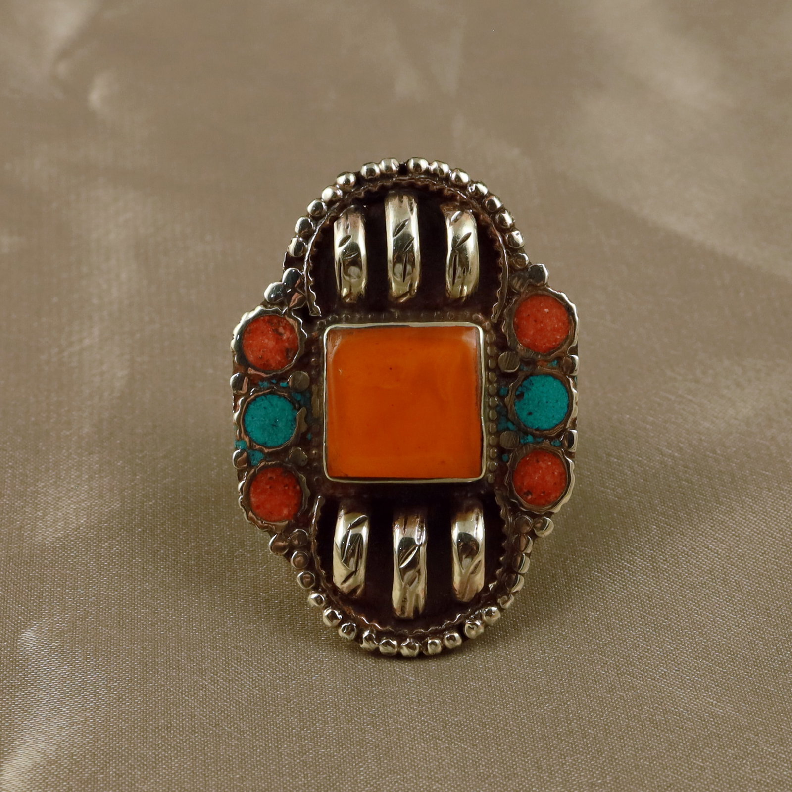 Tibetan Turquoise & Copal Handmade Ring - Free Size: Product ID: 260512154604 Product - Tibetan Natural Handmade Ring Ring Size - Free Size Ring Weight - 17 Gram Gemstone - Natural Turquoise & Coral & Copal Metal - Brass & Copper mix Metal Origin - Nepa