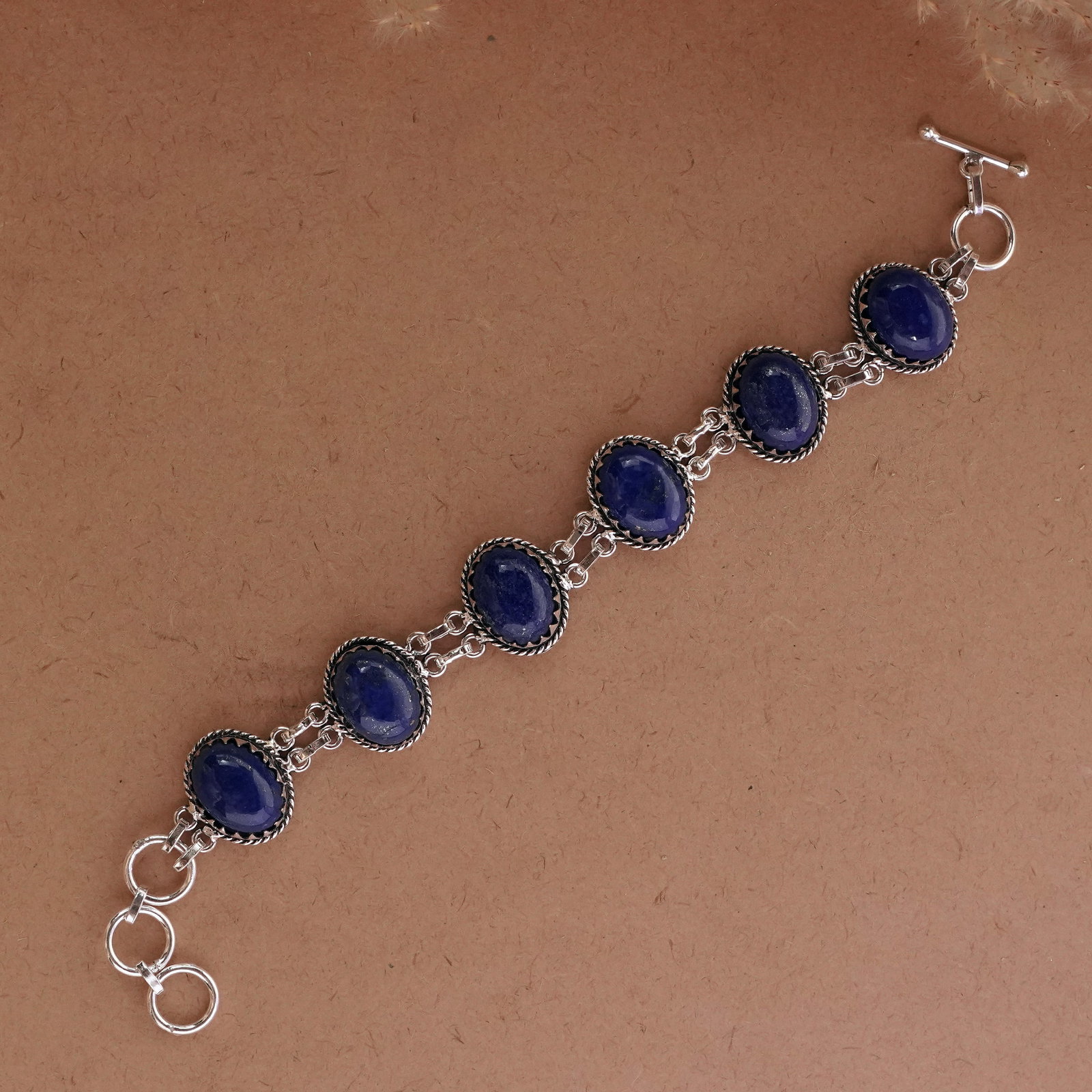 Afghani Lapis Lazuli Silver Plated Handmade Bracelet: Product ID: 260502114919 Product - Handmade Silver Plated Bracelet Metal - 92.5 Sterling Silver Plated Bracelet Length - 6 Inch + 2 Inch Gemstone - Lapis Lazuli Gemstone Size -12X16 ( 6 Stone) Gemston