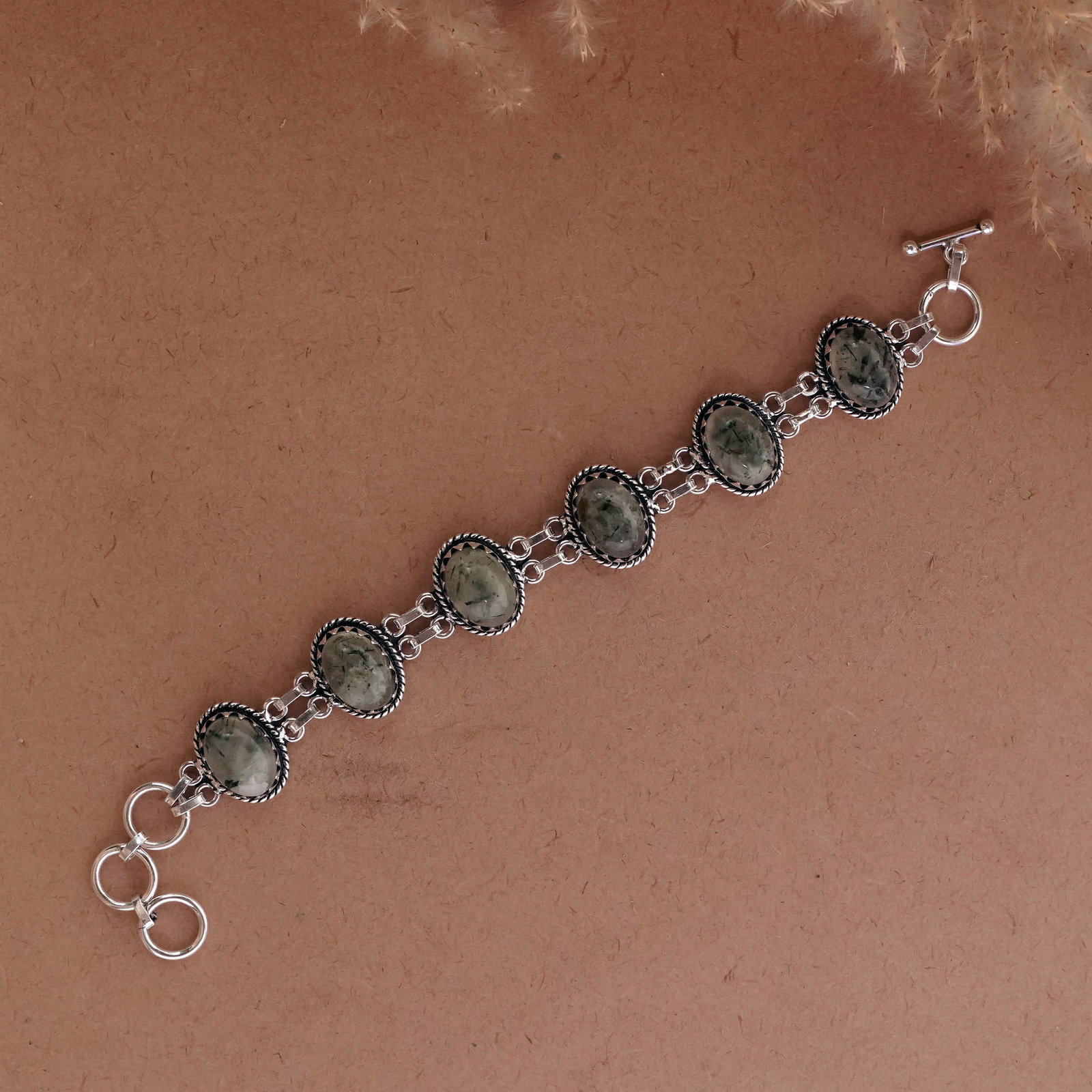 Natural Prehnite Sterling Silver Plated Handmade Bracelet: Product ID: 260502114241 Product - Handmade Silver Plated Bracelet Metal - 92.5 Sterling Silver Plated Bracelet Length - 6 Inch + 2 Inch Gemstone - Prehnite Gemstone Size -10X14 ( 6 Stone) Gemstone Or