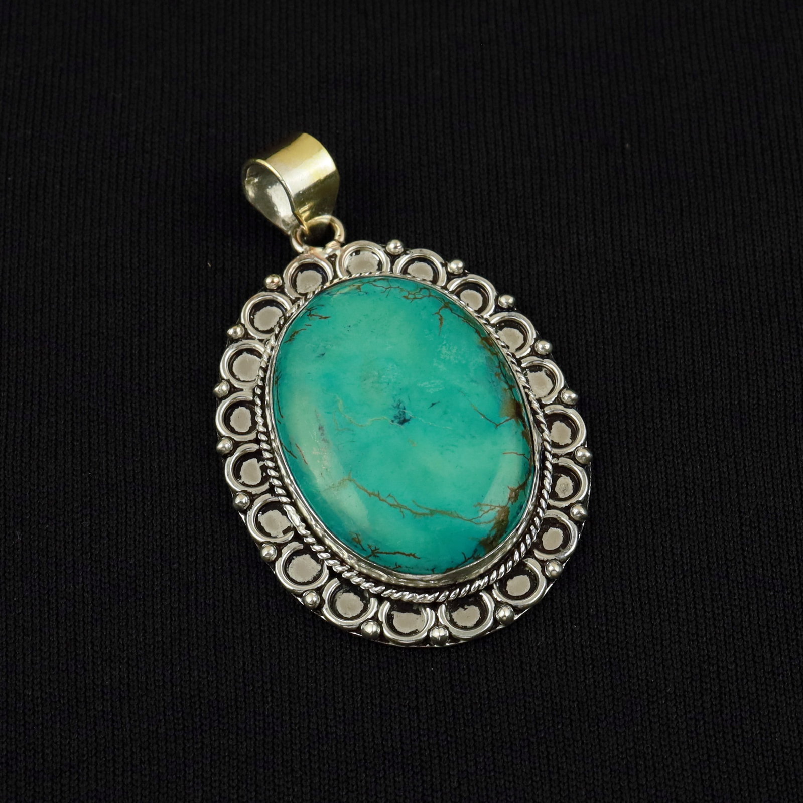 Natural Turquoise Sterling Silver Plated Handmade Pendant: Product ID: 260513103614 Product - Handmade Silver Plated Pendant Metal - 92.5 Sterling Silver Plated Pendant Size - 4x3.5 CM Gemstone - Turquoise Gemstone Origin - Tibet Gemstone Shape - Oval Pendant